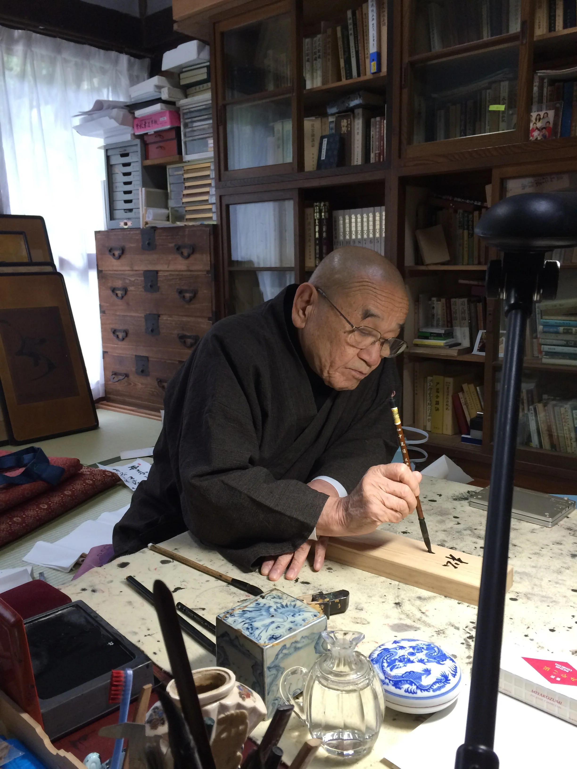 Hoitsu Roshi, a master calligrapher, in his office at Rinso-In.