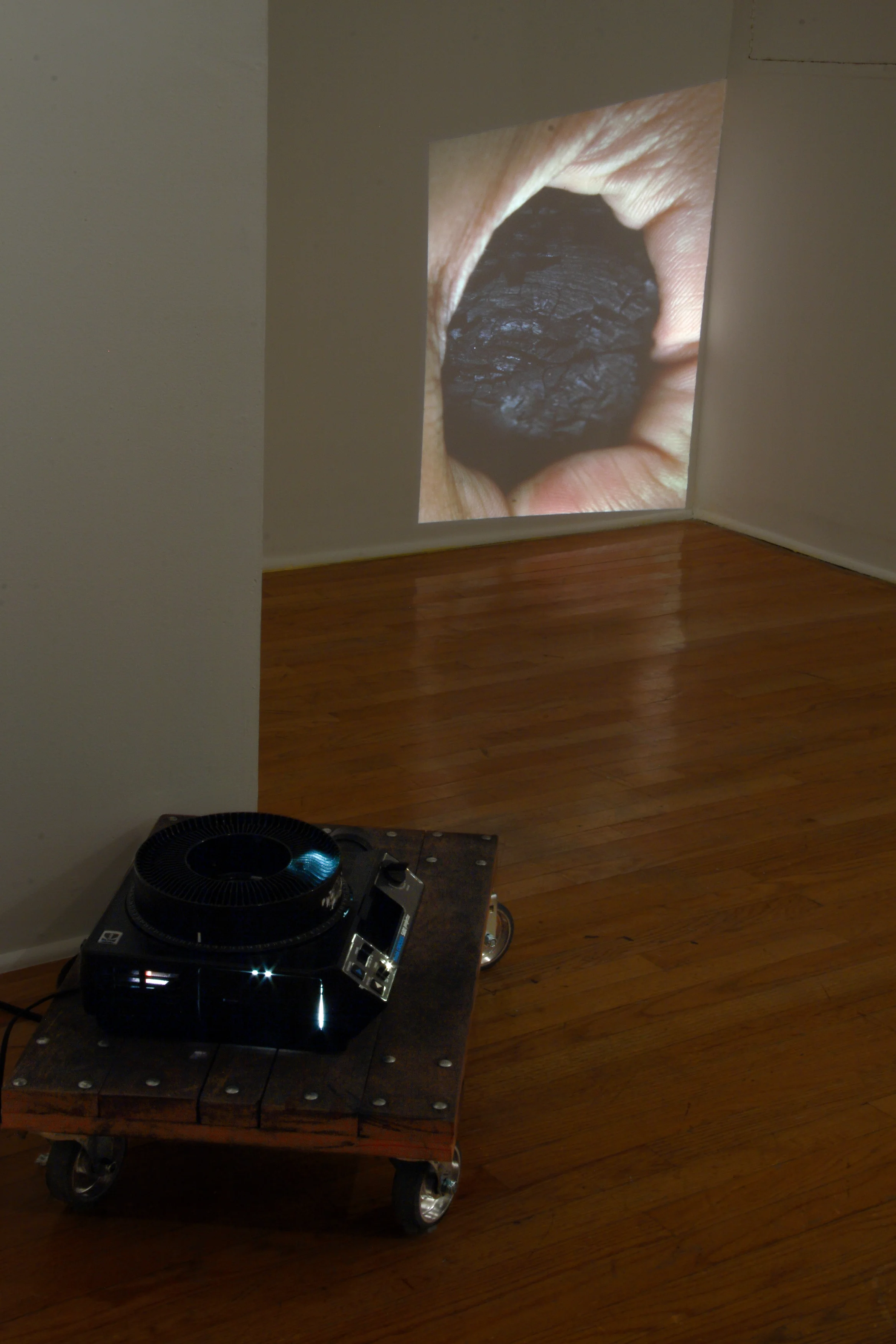 Orbiter , 2007 single slide, slide projector, moving dolly