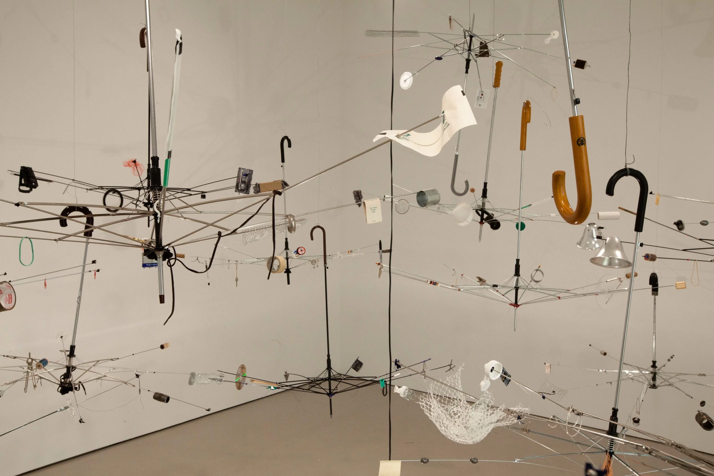 Orrery , 2011 umbrellas, turntable, studio detritus and mixed media dimensions variable