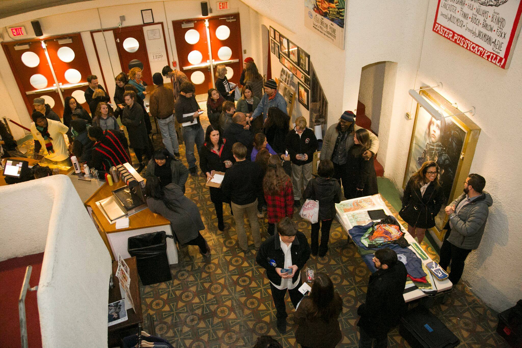 A CROWD GATHERS AT THE TEXAS THEATER FOR OUR SCREENING OF "CAN YOU DIG THIS" WITH RON FINLEY