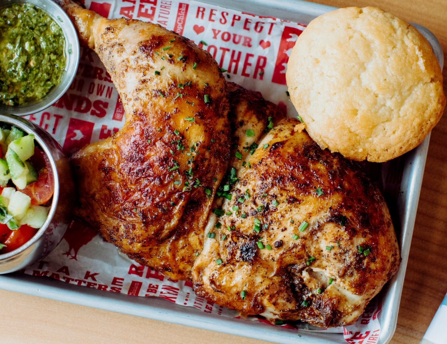 grilled chicken quarter with salad, sauce, and cornbread.jpg