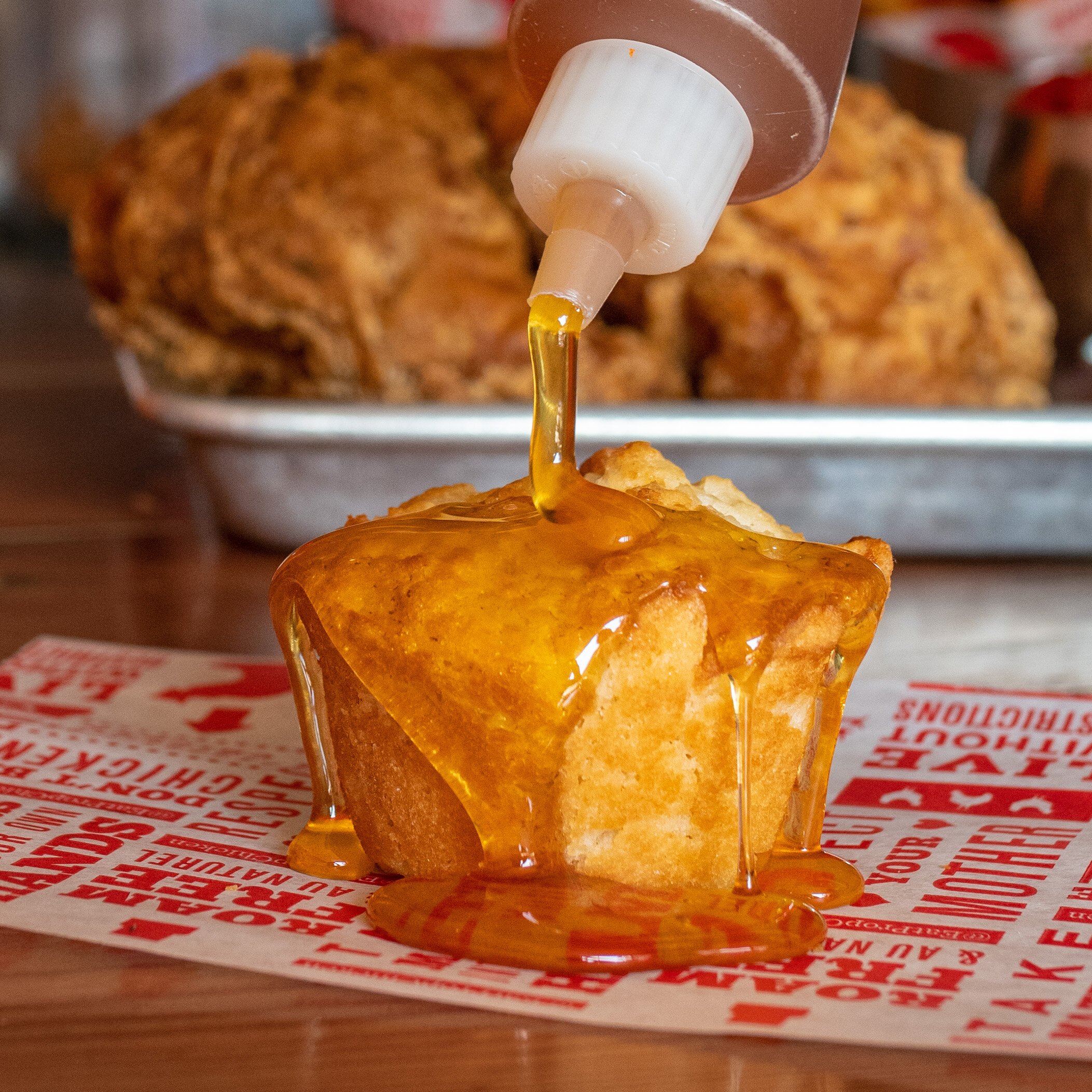 honey pouring over cornbread.jpeg