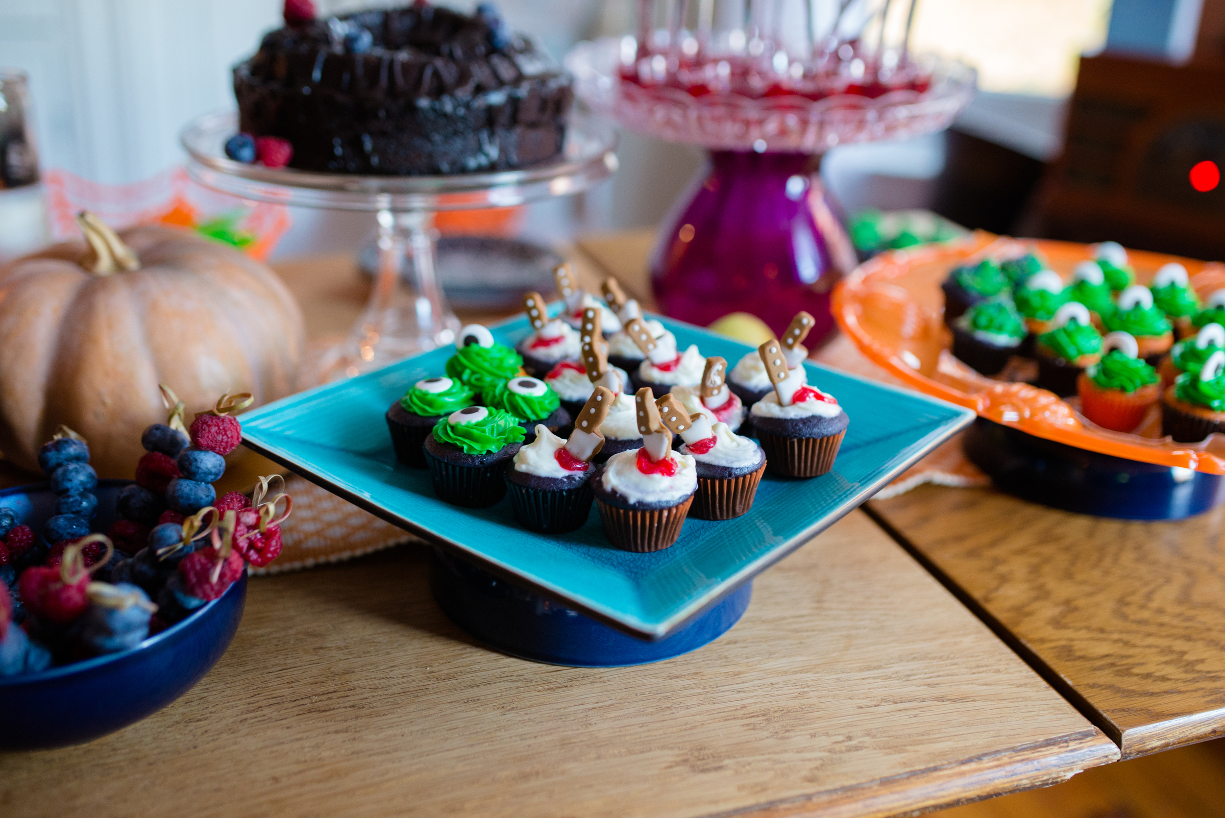 Mini Monster cupcakes and Mini Knife Cakes. Both the knives and the mini eyes are made my Wilton . 