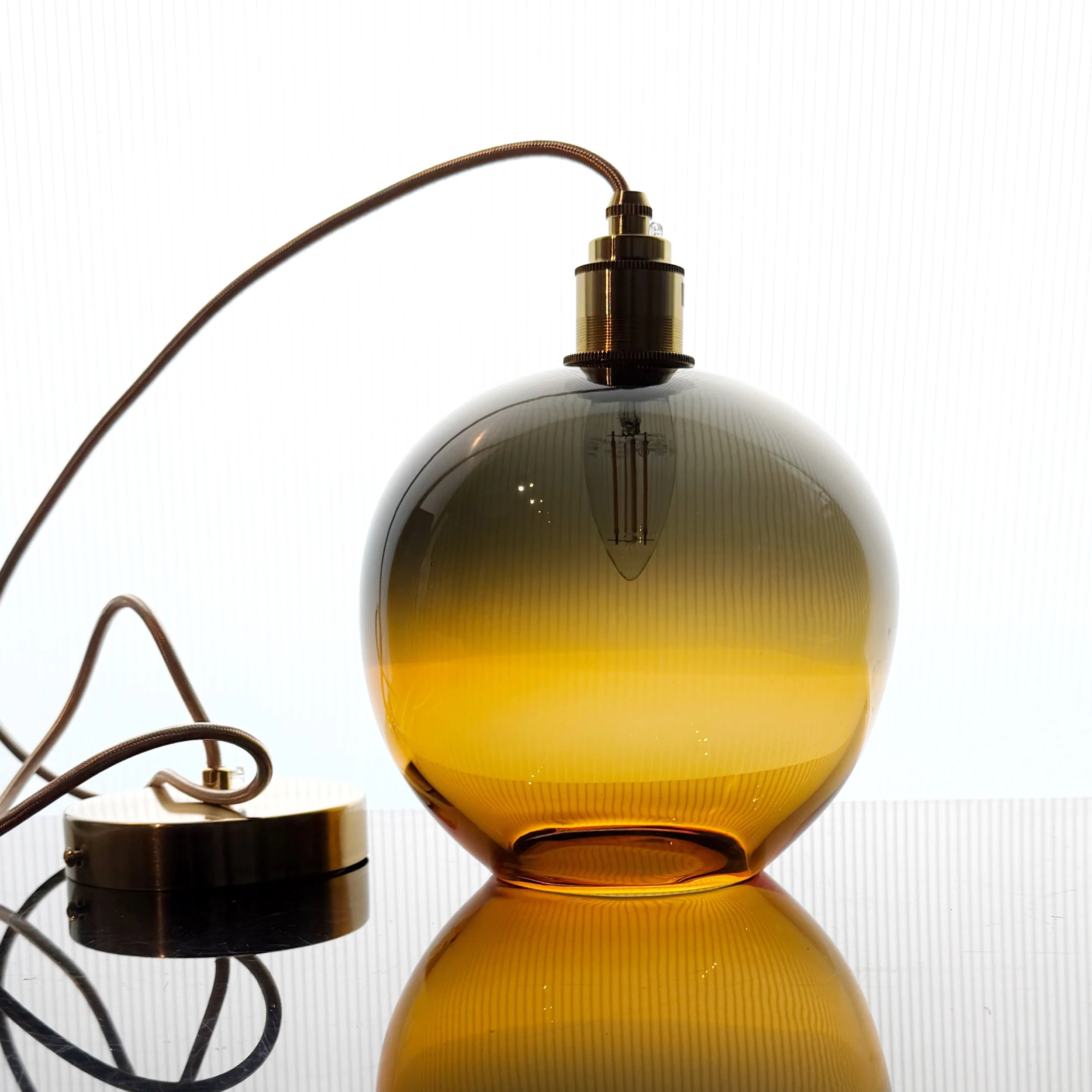 Mid century style Amber / Grey pendant lights