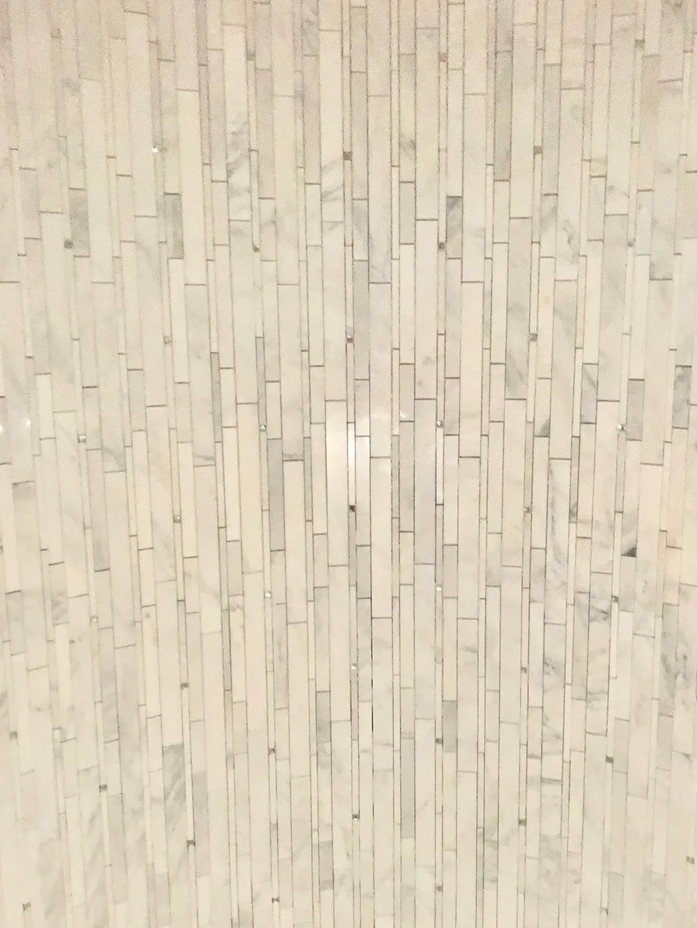 Another sneak peak of some tile going in, this is found in the shower of the same sweet girl's room. The tile is white and bright with subtle sparkles all around. This picture (which was taken in the dark!) does not do it justice! 