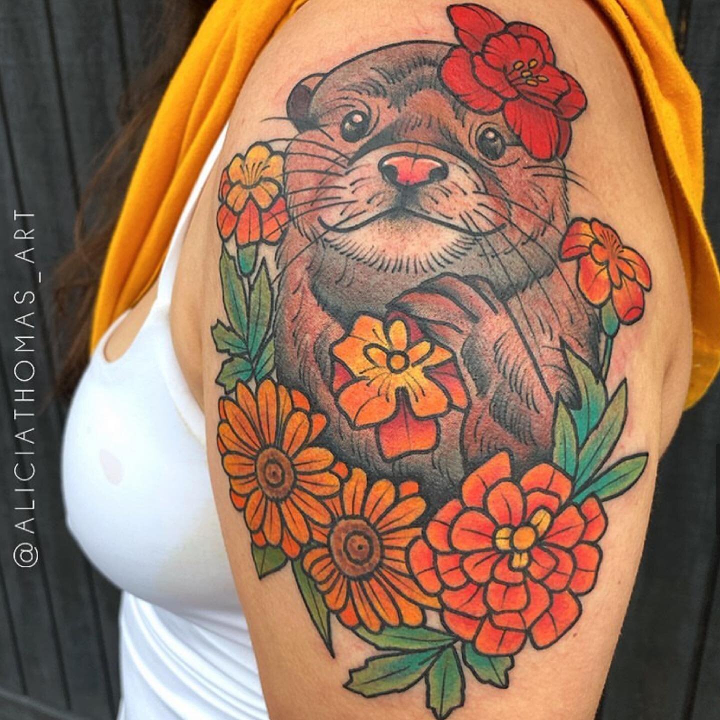 An otter adorned with her marigolds recently made by @aliciathomas_art 
*
For all future bookings reach out to her via email.
*
Aliciathomas_art@yahoo.com
*
#aliciathomas #aliciathomas_art #ladytattooers #ladiesladiesartshow #supportgoodtattooing #bo