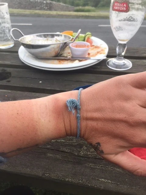 My wee little tan line. If you know me, you know I don't tan so this is like...a first! Also in the background you can see the destroyed curry chicken and stella. Exactly what you need after a long day's hike. 