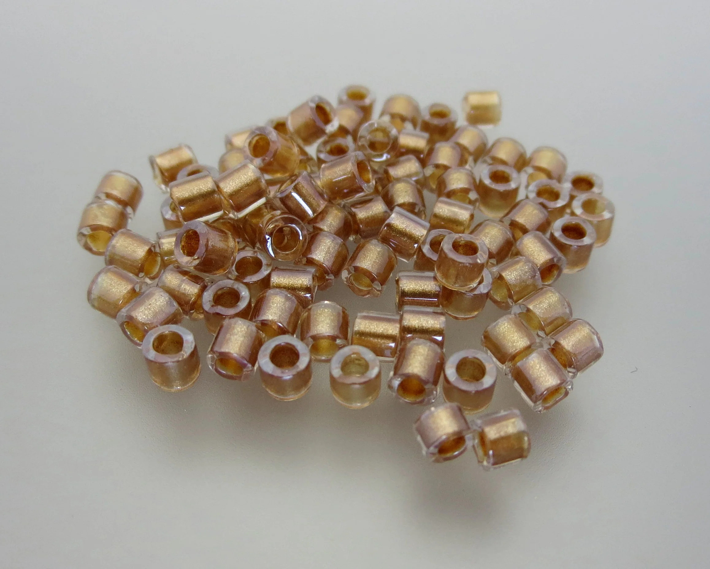 Size 8 Delica Bead Miyuki Japanese Seed Bead by The Buffalo Bead Gallery. 