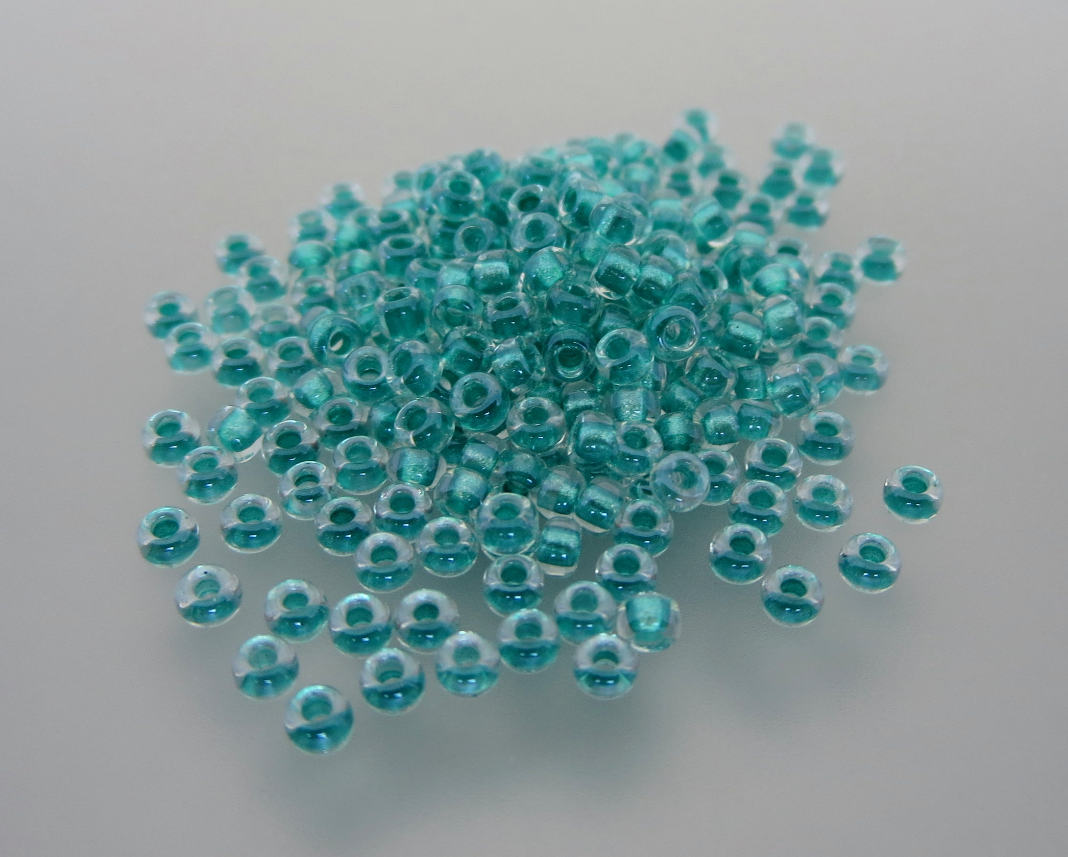 11º Japanese Seed Bead - Sparkle Aqua Green Lined Crystal AB (#2605)