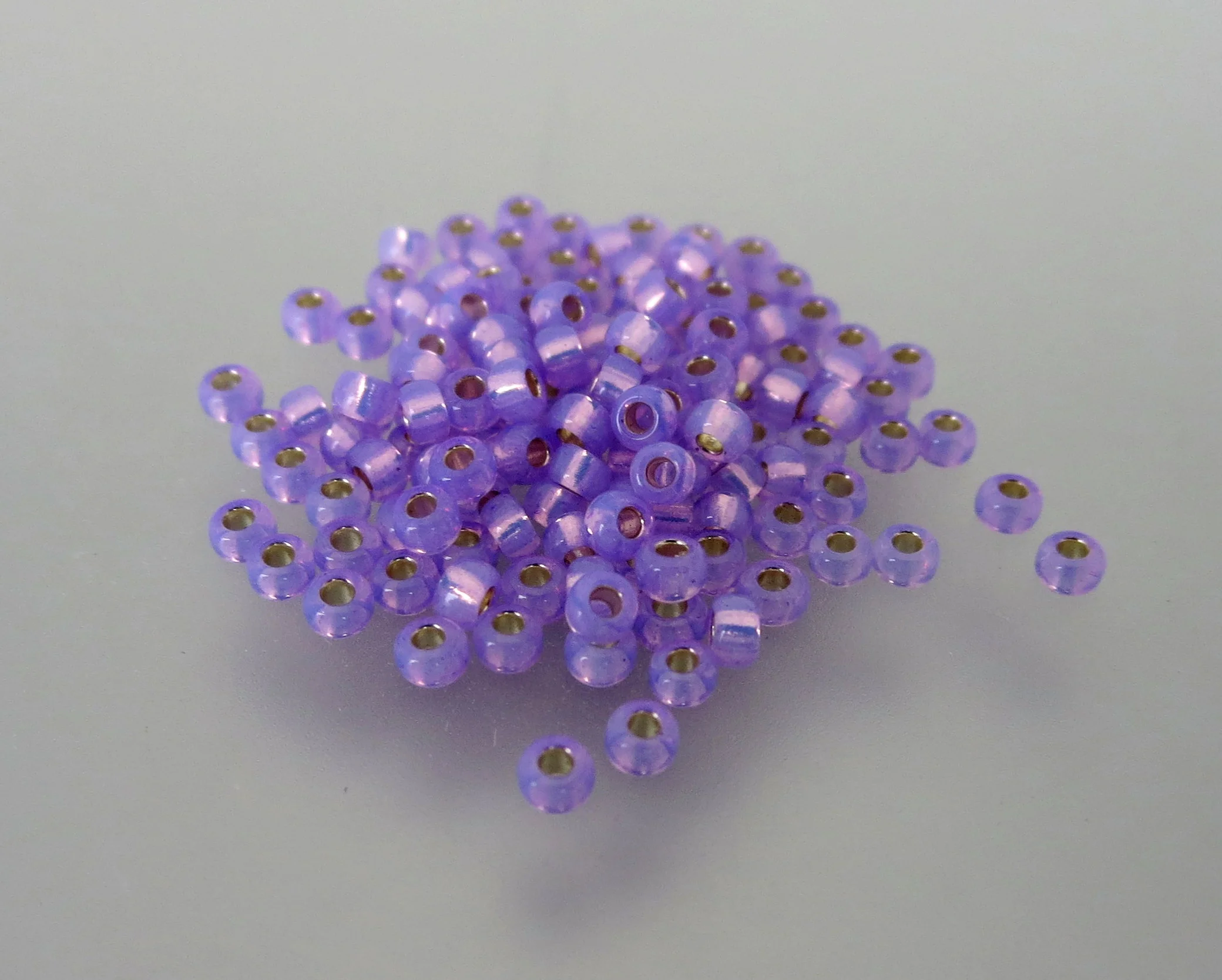 11º Japanese Seed Bead - Dyed Lilac S/L Alabaster (#574)