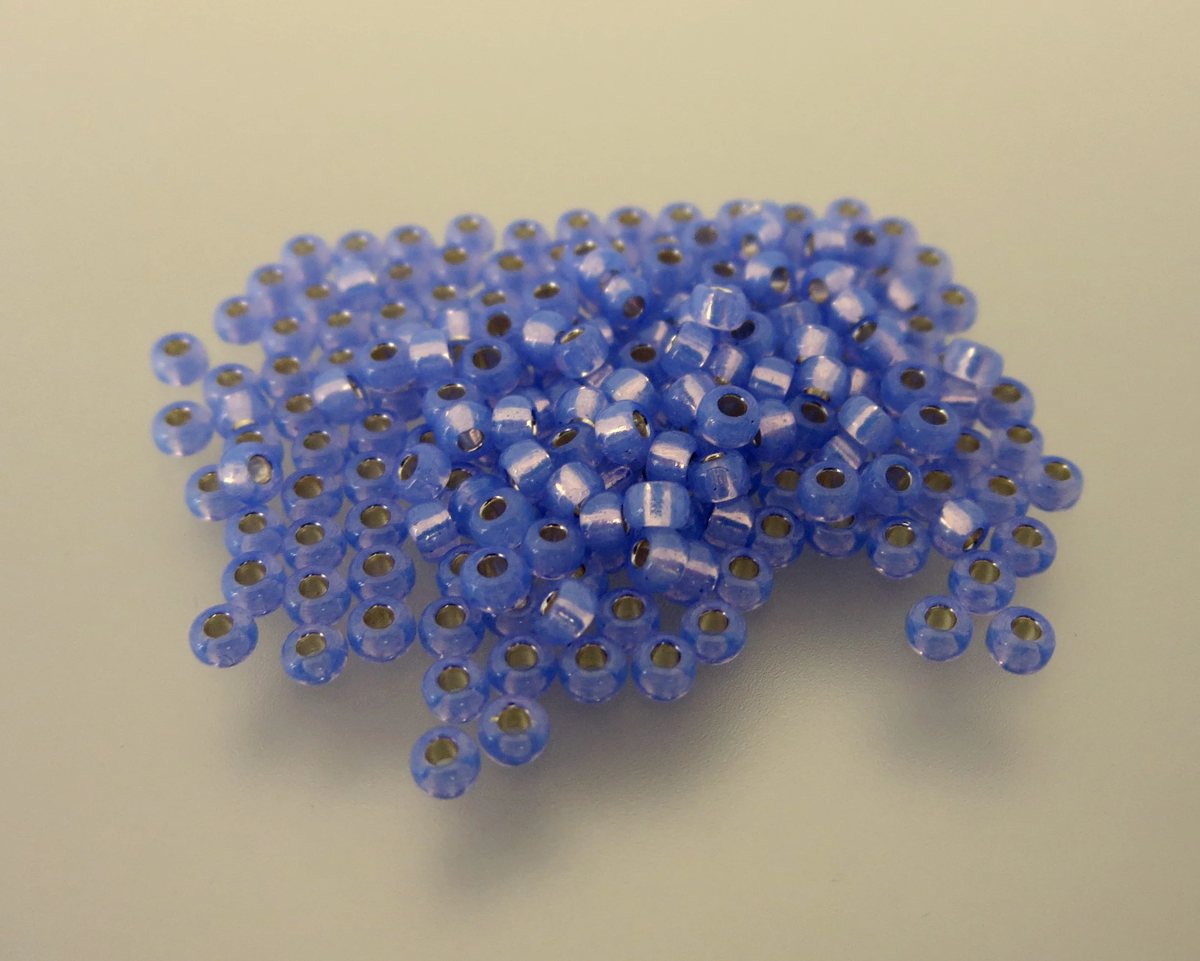 11º Japanese Seed Bead - Dyed Violet S/L Alabaster (#649)