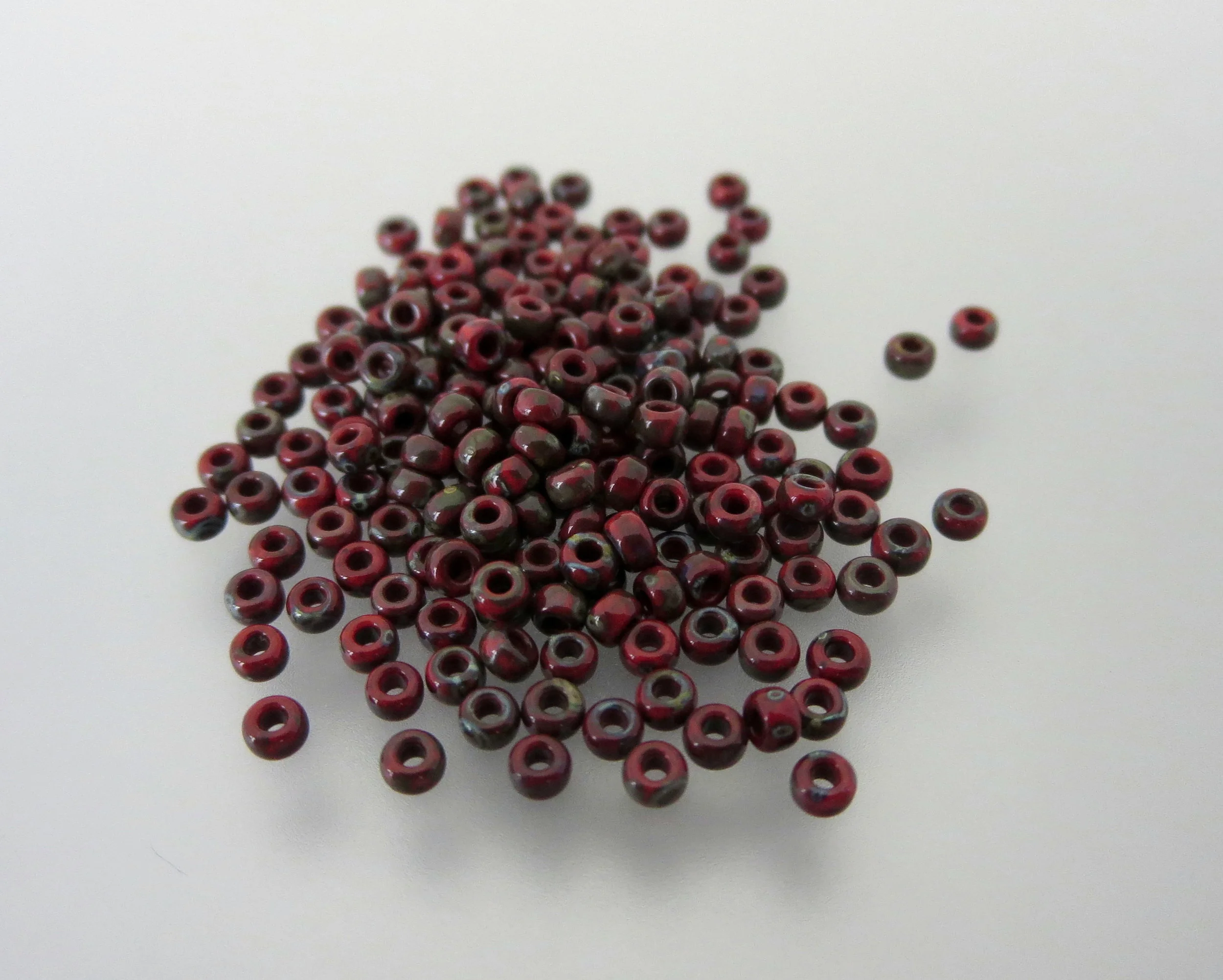 11º Japanese Seed Bead - Op Red Picasso (4513)