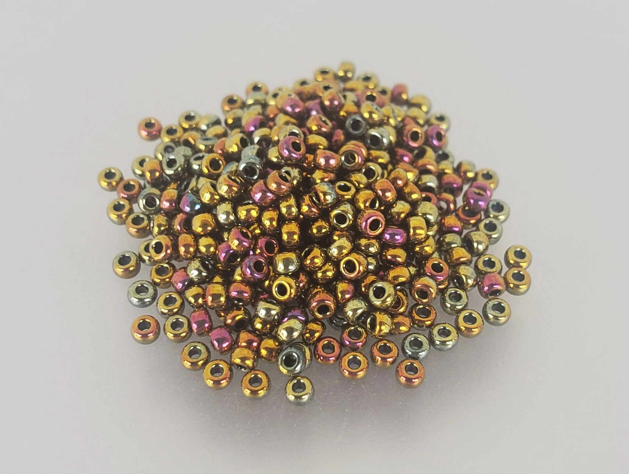 11º Japanese Seed Bead - (#462) Metallic Gold Iris-10 grams