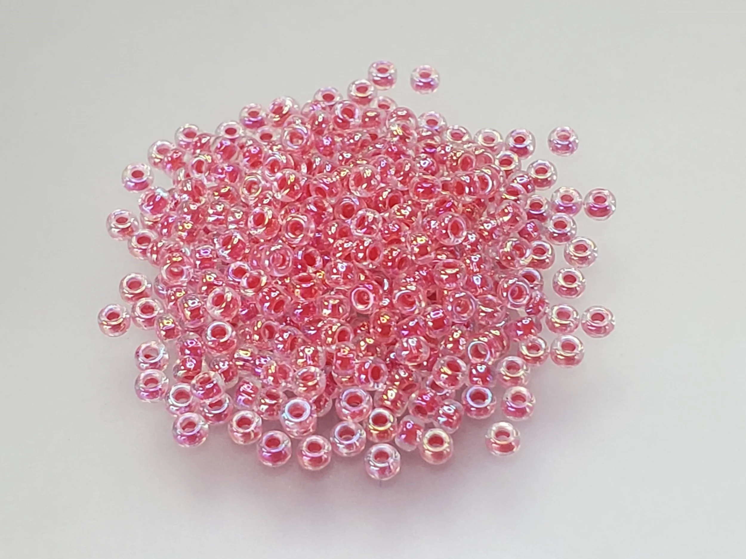 11º Japanese Seed Bead - (#276) Dark Coral Lined Crystal AB