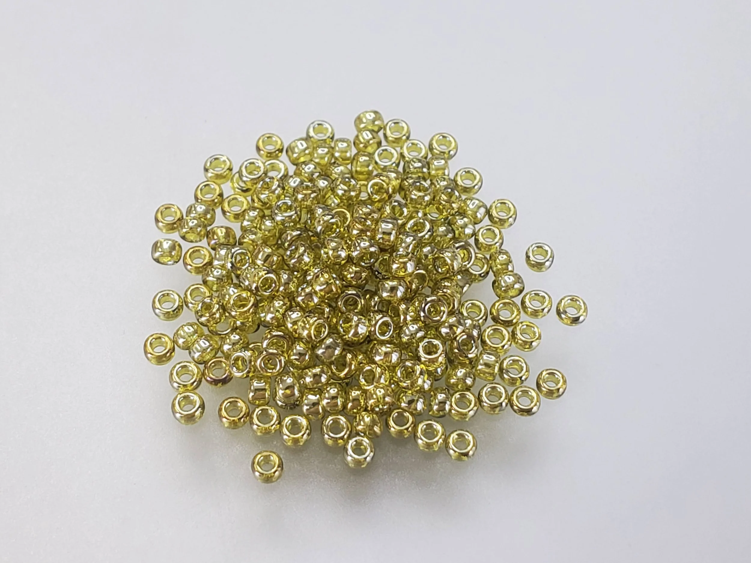 11º Japanese Seed Bead - (#1889) Transparent Golden Olive Luster