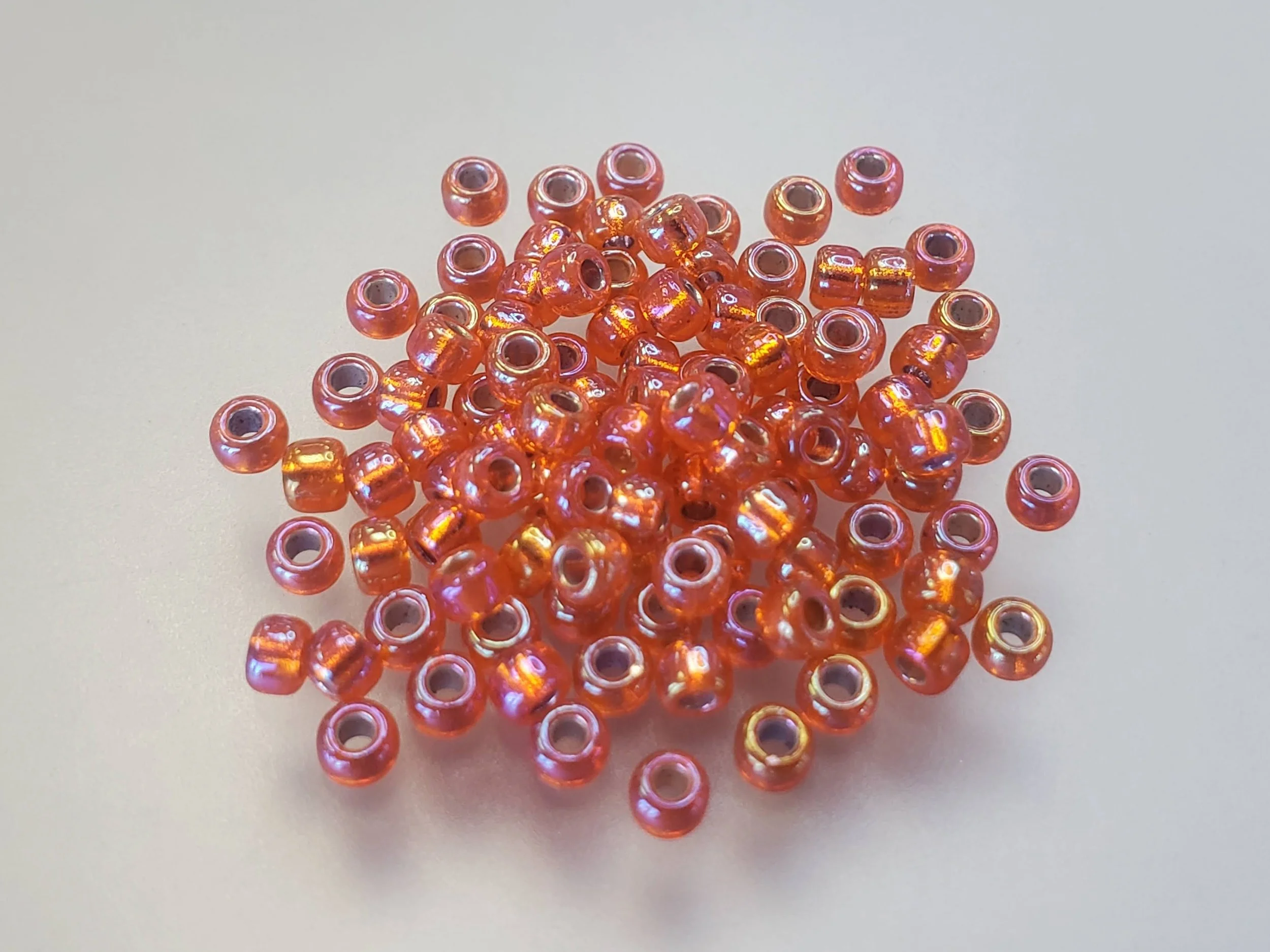 8º Japanese Seed Bead - (#1008) Silverlined Orange AB