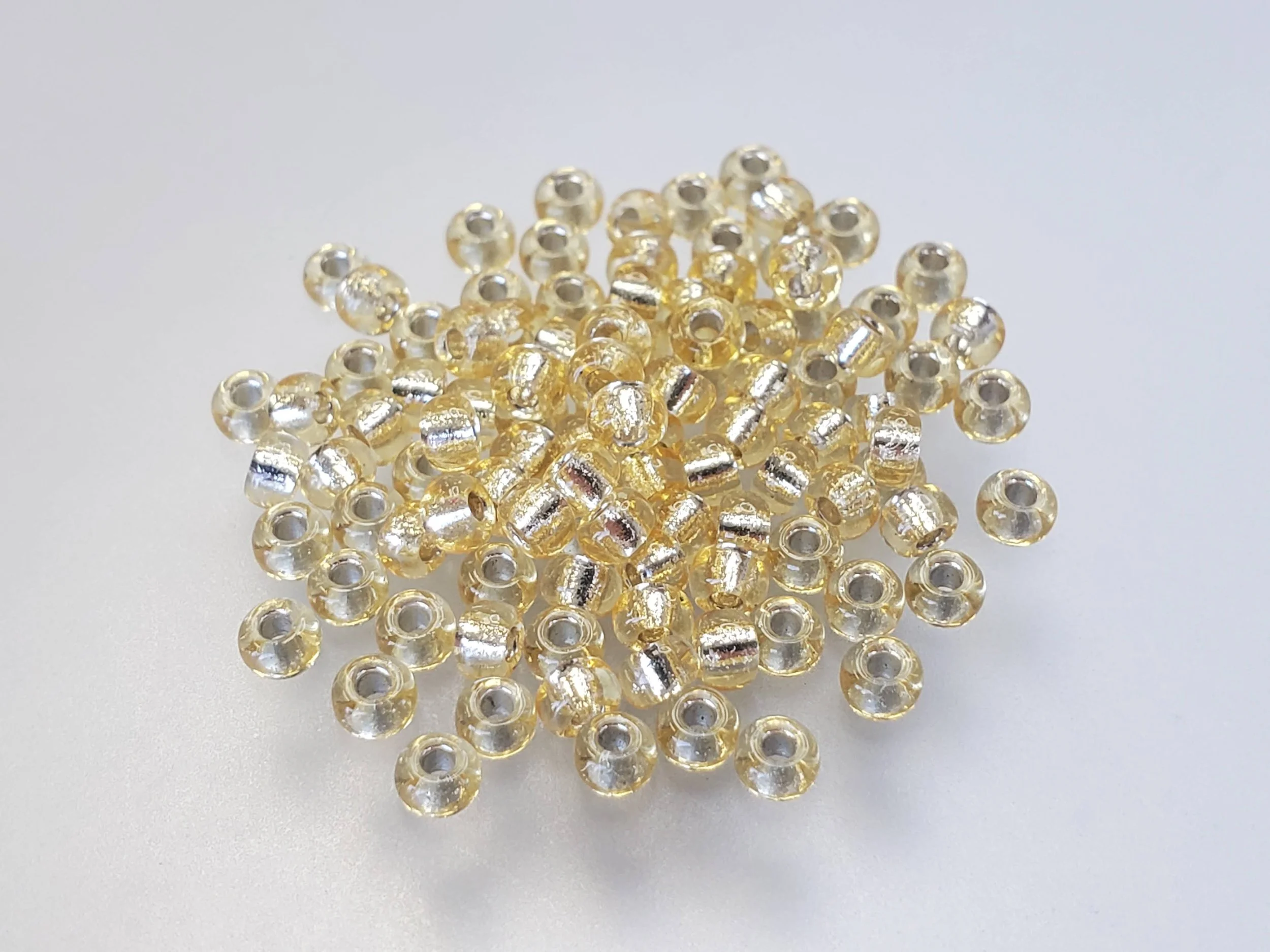 8º Japanese Seed Bead - (#2) Silverlined Light Gold
