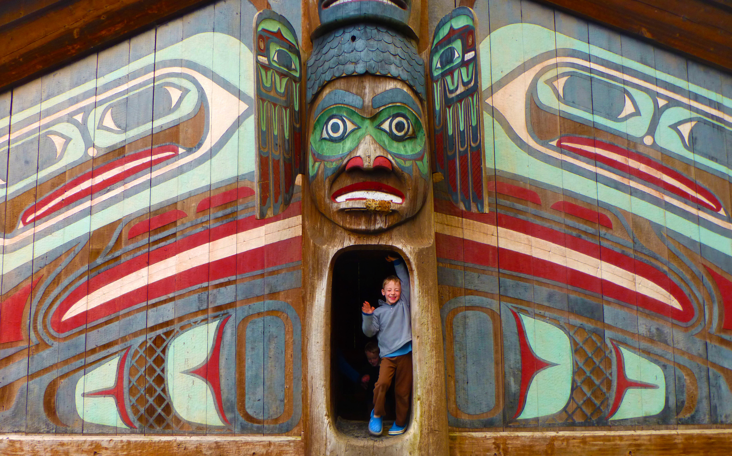  Playing hide & seek at Totem Bight State Park, Ketchikan, Alaska.  