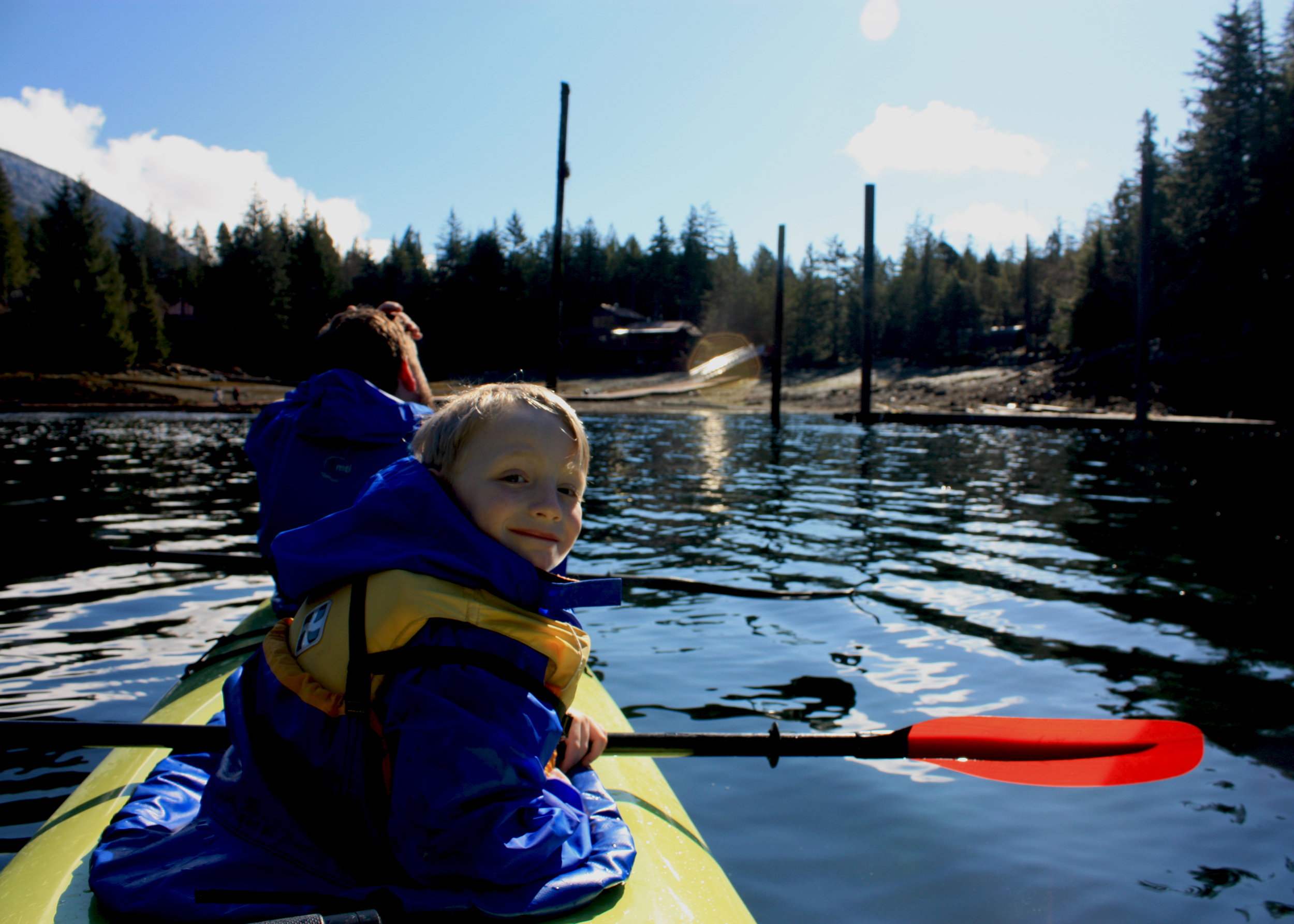  Clancy enjoys the scenery from his center seat in a triple kayak on a beautiful, sunny day here in Ketchikan. 