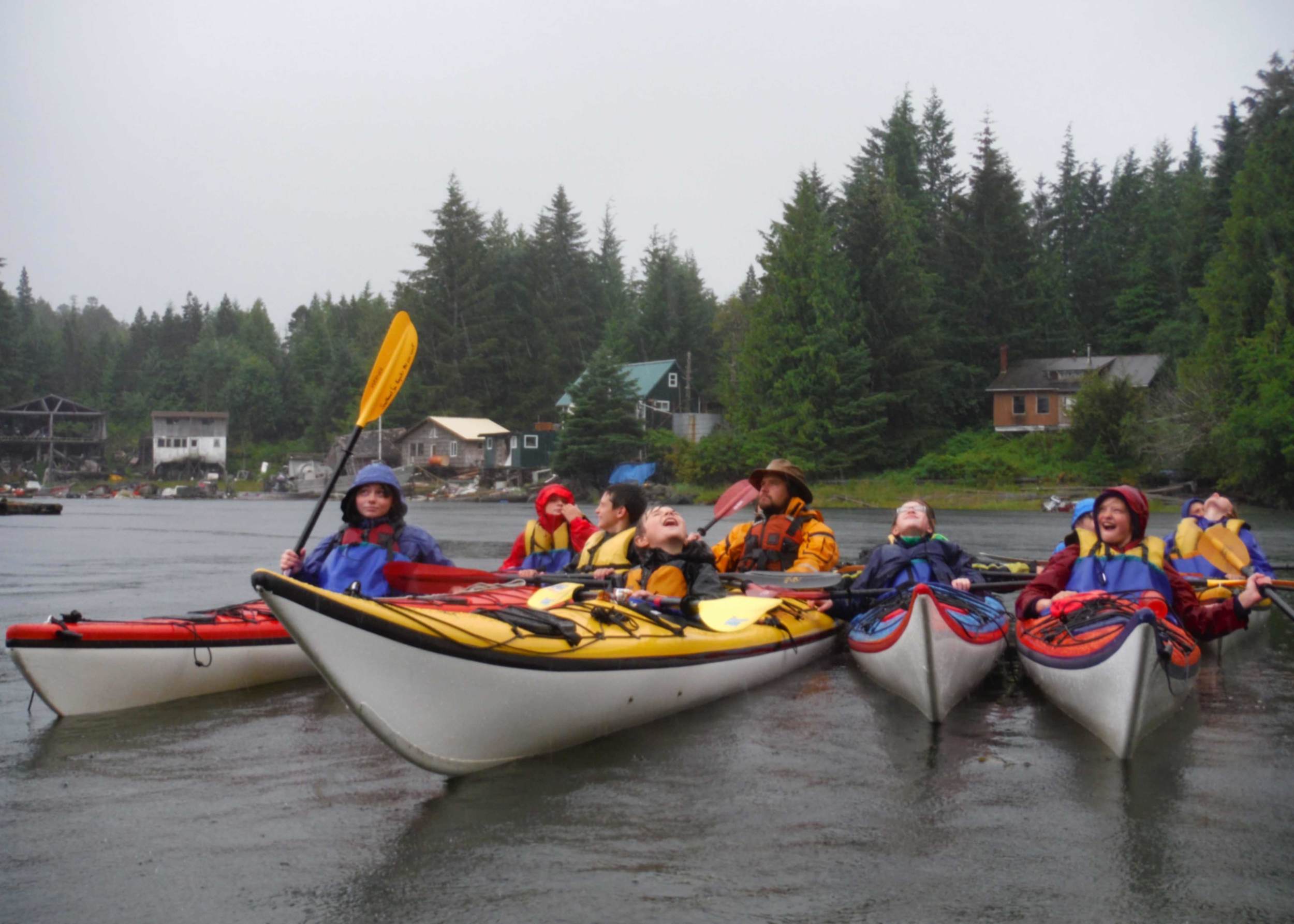  Torrential rain never stops Ketchikan Kids from having fun! Kids with instructor, James White. 