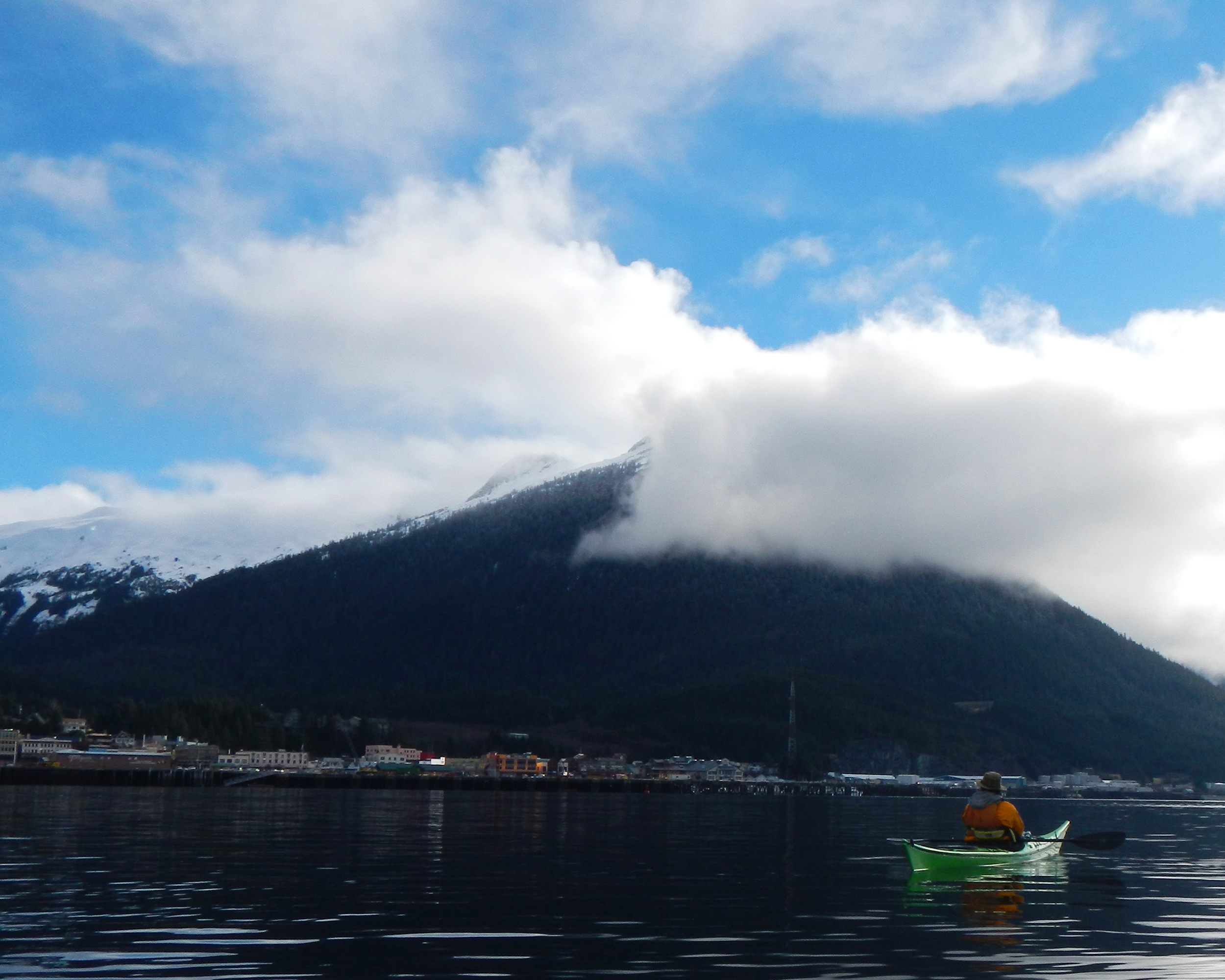  The town of Ketchikan, with Deer Mountain above and James in his kayak. 