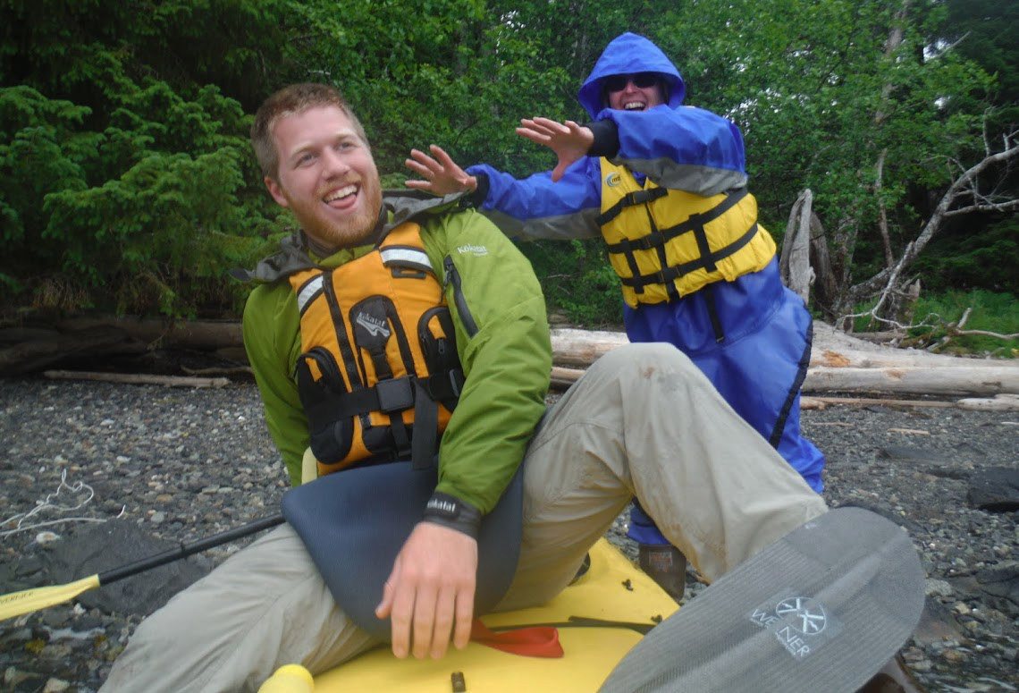  Andre gets a friendly shove from a guest during a lunch break on the Icehouse Cove Kayak/Hike trip. 