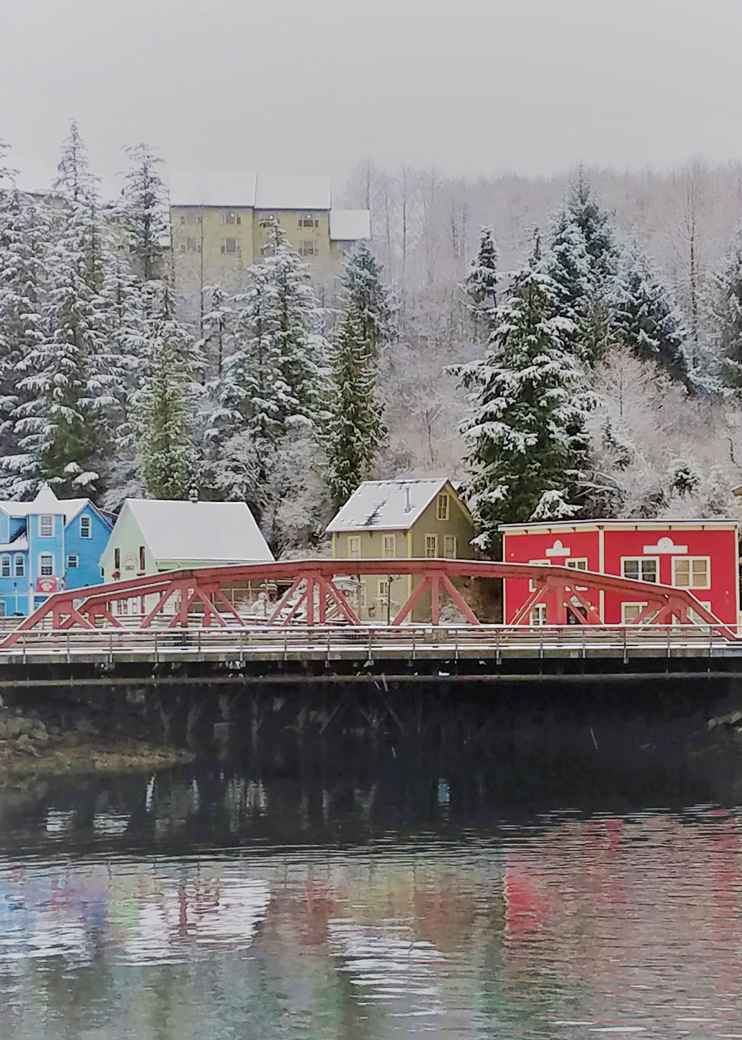  Ketchikan's red bridge and the brightly colored houses of the former red light district.  