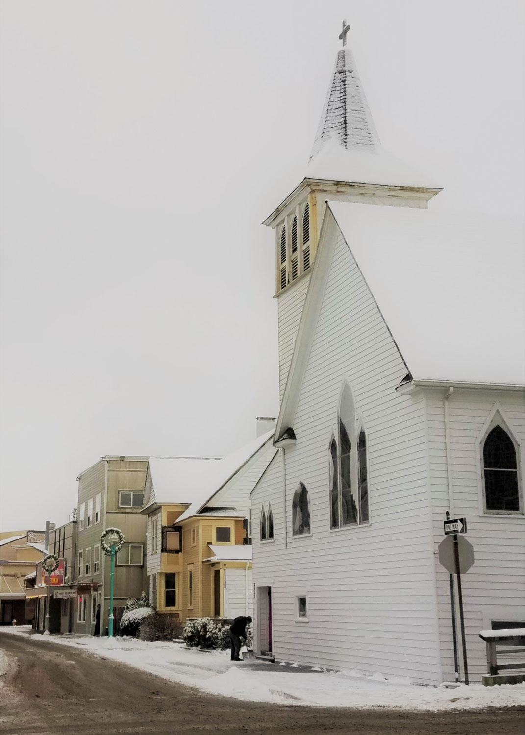  Looking down Mission Street to St. John's Church and the Gross Alaska Cinema: Ketchikan's two screen movie theater.  