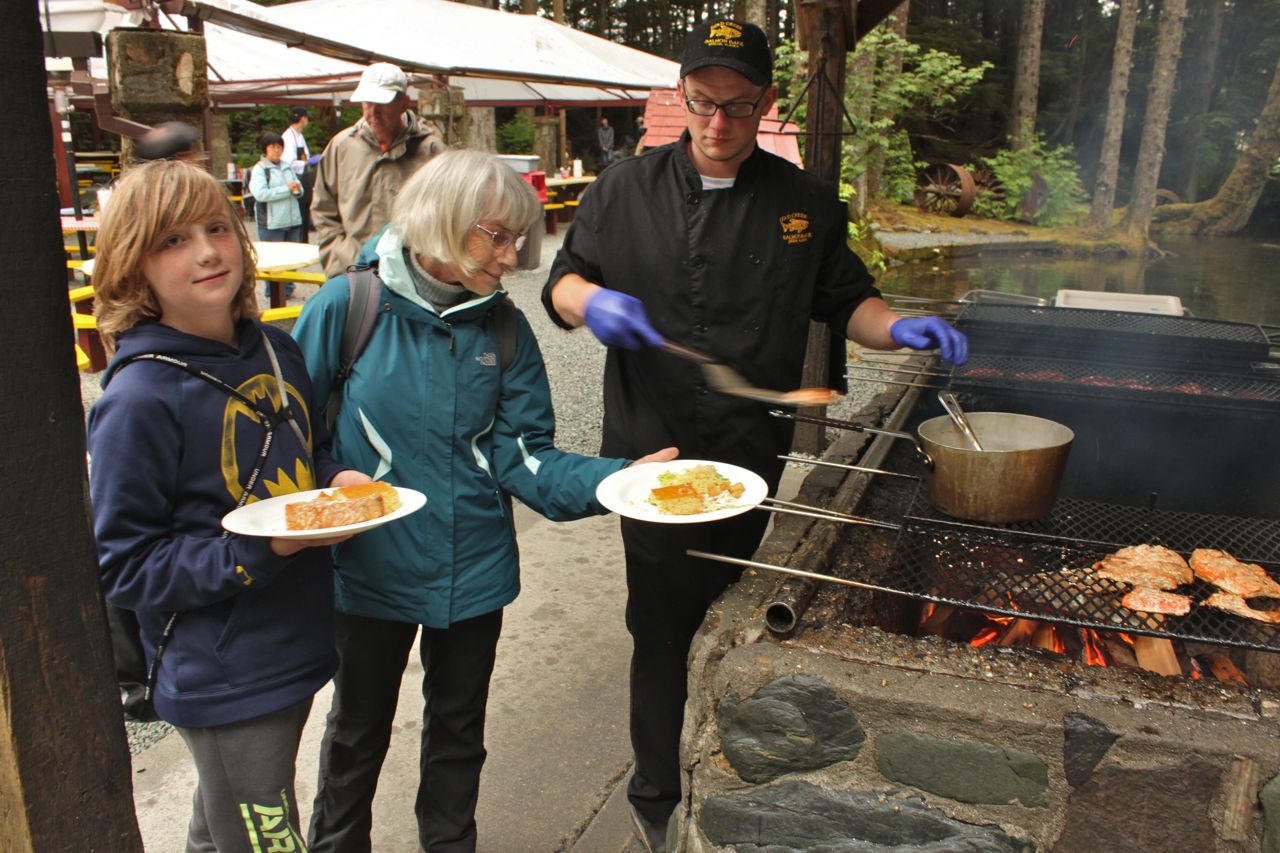 Clancy and Grandma enjoying the food at the Gold Creek Salmon Bake in Juneau, Alaska. 