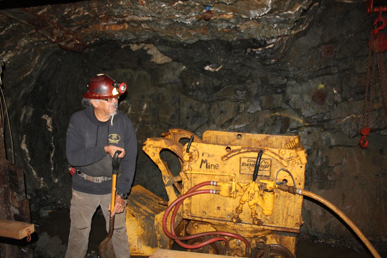  Bob, the miner, explains a pneumatic shovel at the Gastineau Mine Tour. 