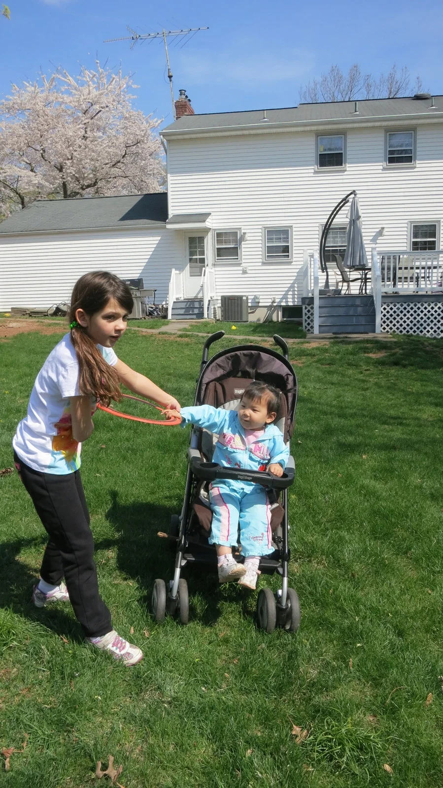 Helping Abigail play Frisbee.