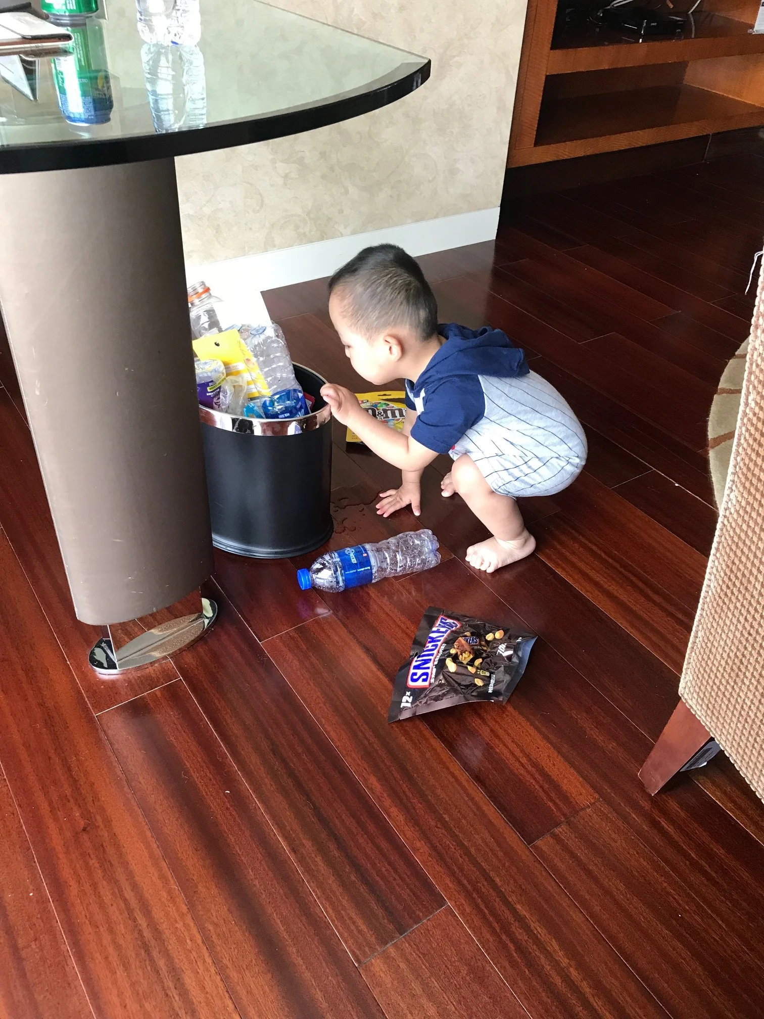 Helping himself to the garbage.