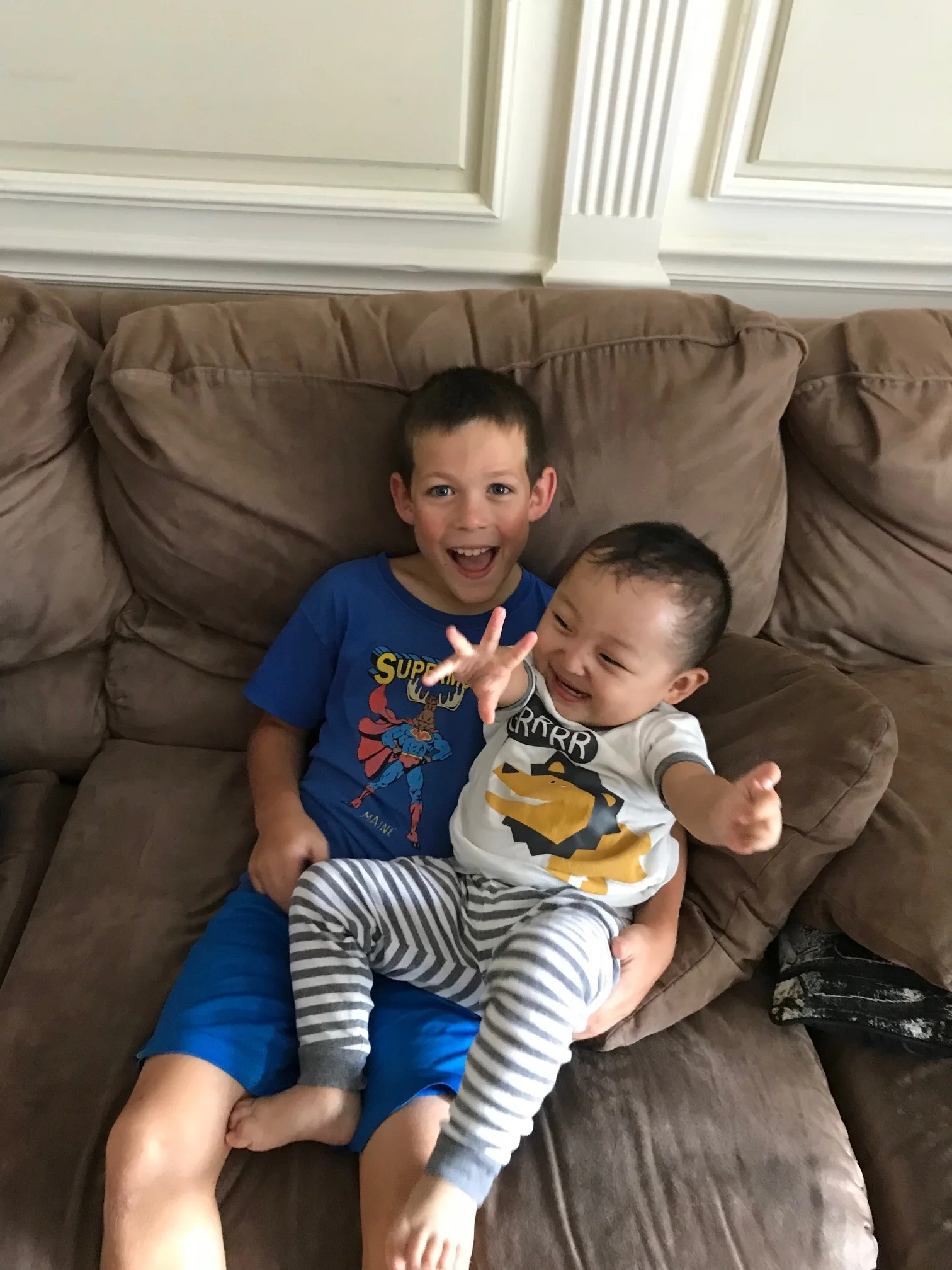 Getting to know his big brother. 