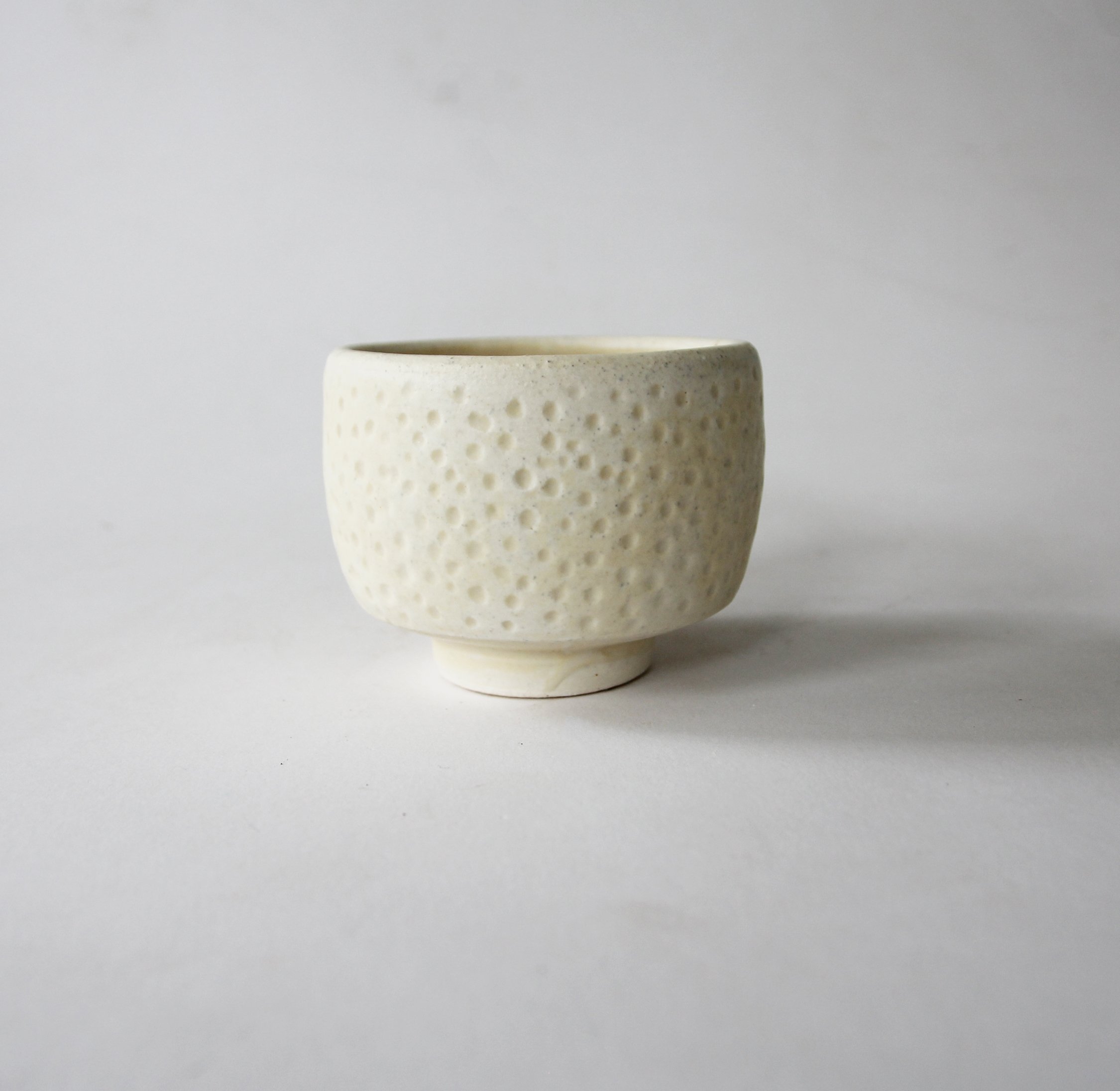  Ceramic cups inspired by Sand Under a Microscope. 2022.  