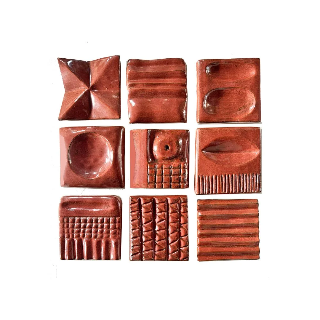  Handcarved tiles inspired by wood carvings. 