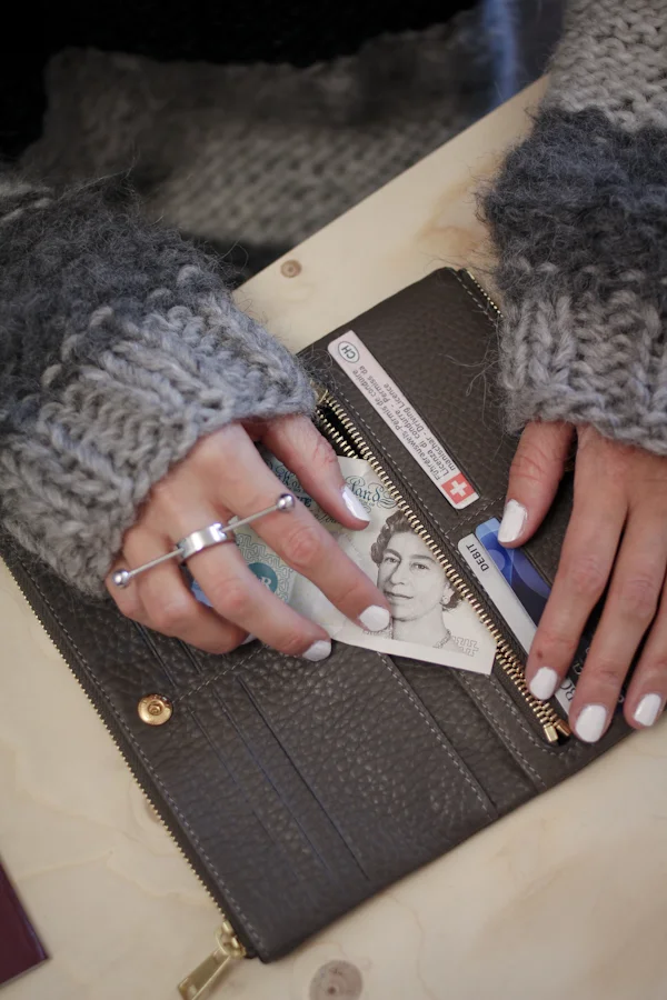 Jennifer Inglis wearing Gudrun & Gudrun jumper with RODTNES fold-over purse and BACK ring.