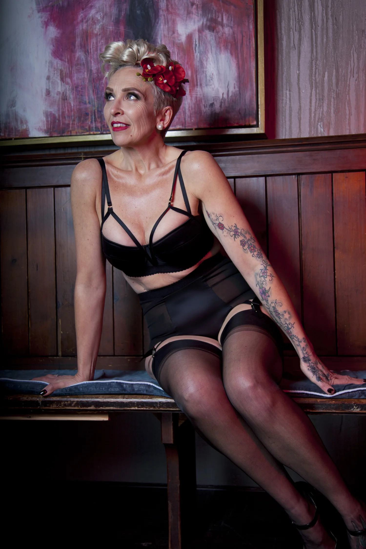 Karen wears the Candace Noir set , and hair flower by our friends at Bettie Page Hair