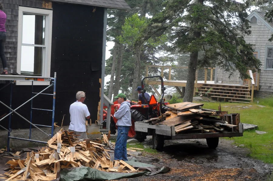 June 25th Volunteer Day, stripping old shingles