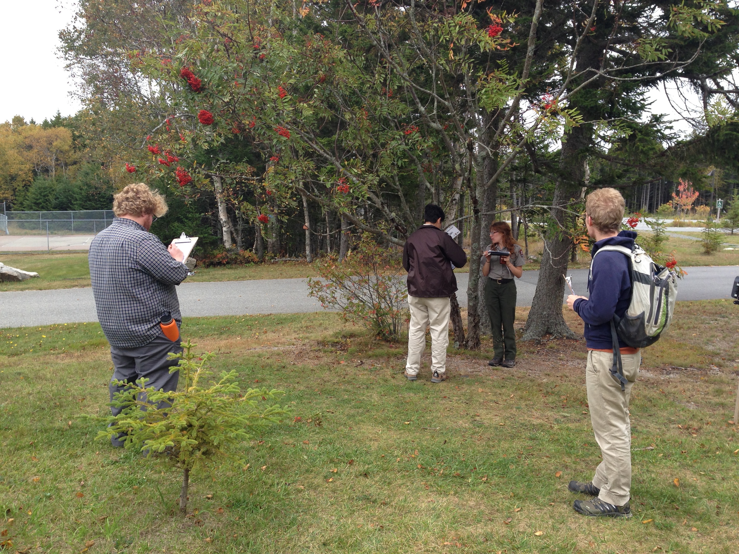 Symposium attendees collecting phenology data.