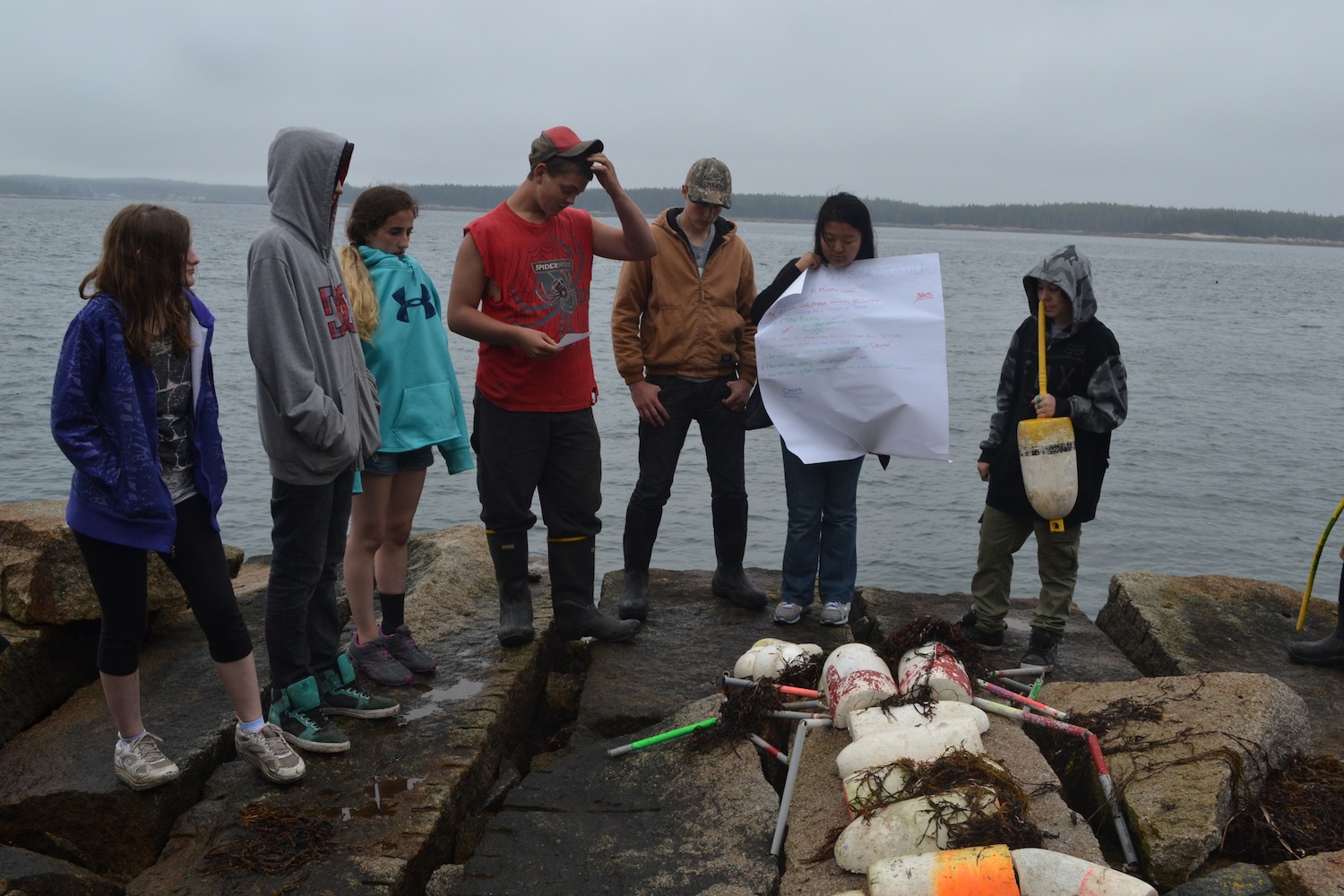 Students share the marine debris art sculptures they created during the 2014 Pathways 101 program on Hurricane