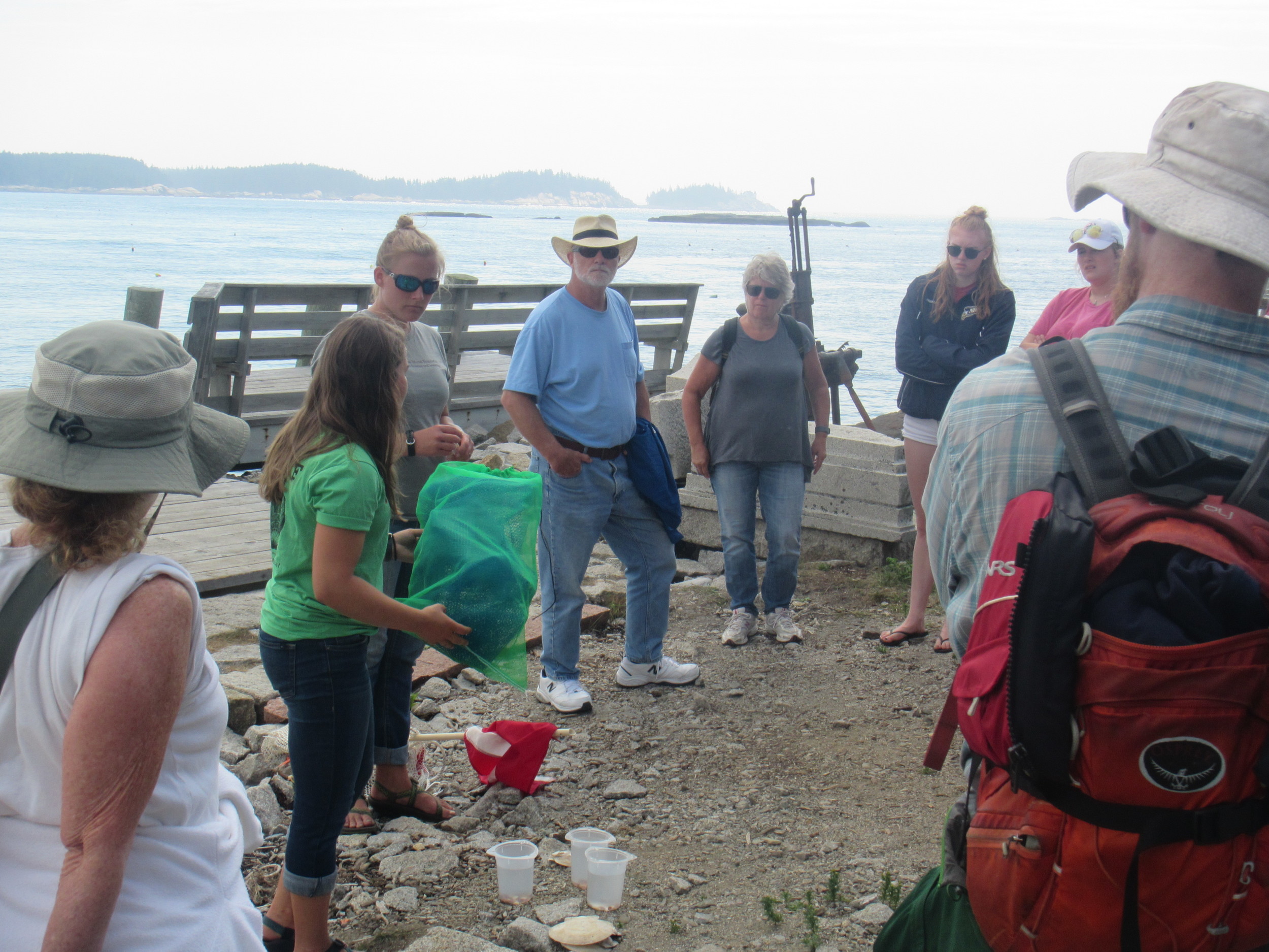 Research staff (Director Cait Cleaver, Intern Jessie Batchelder) share their work on scallops with the Vinalhaven Land Trust group