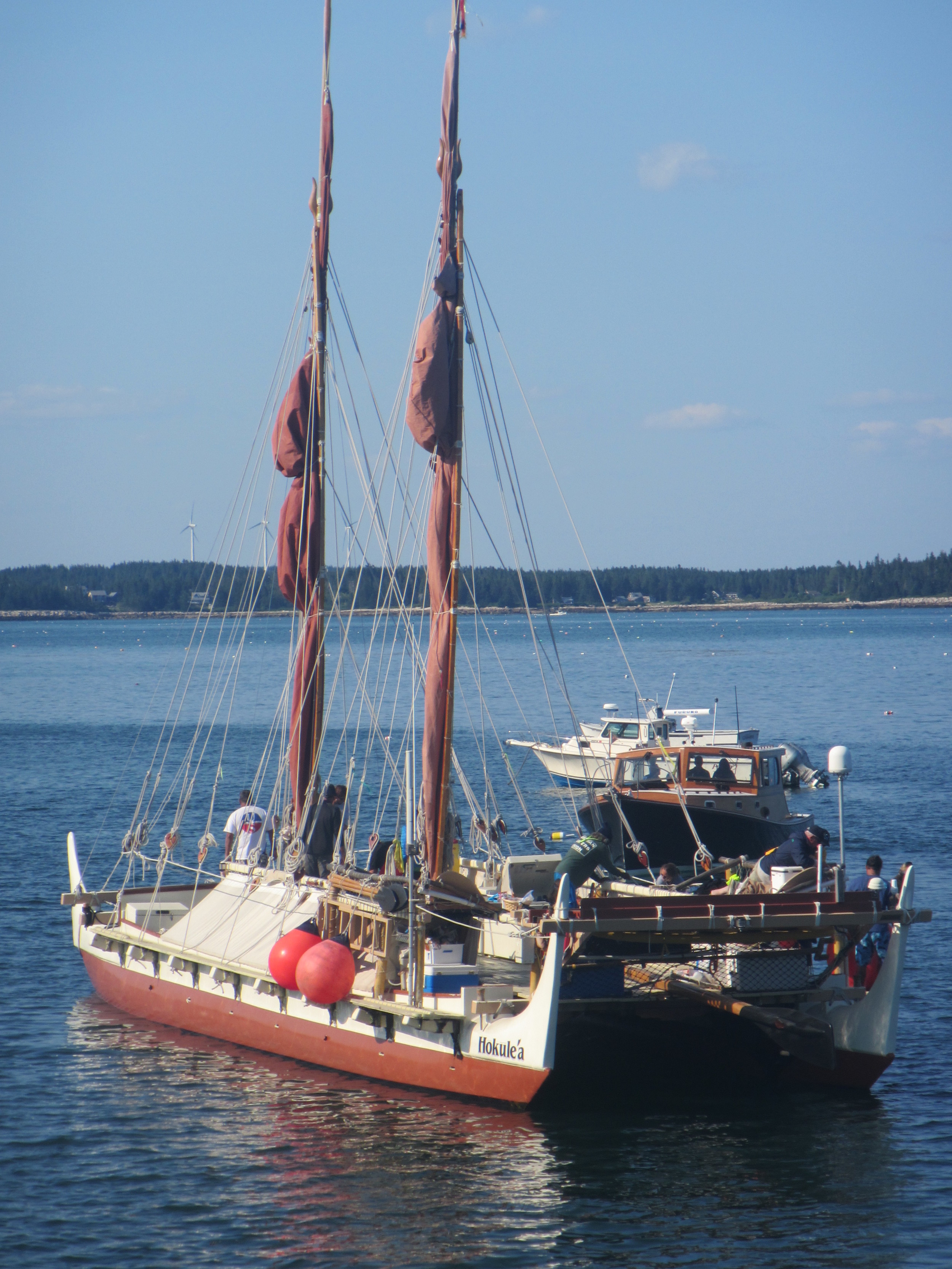 Hokule'a, a traditional sailing canoe from Hawai'i, paying Hurricane Island a visit on their Worldwide Voyage.