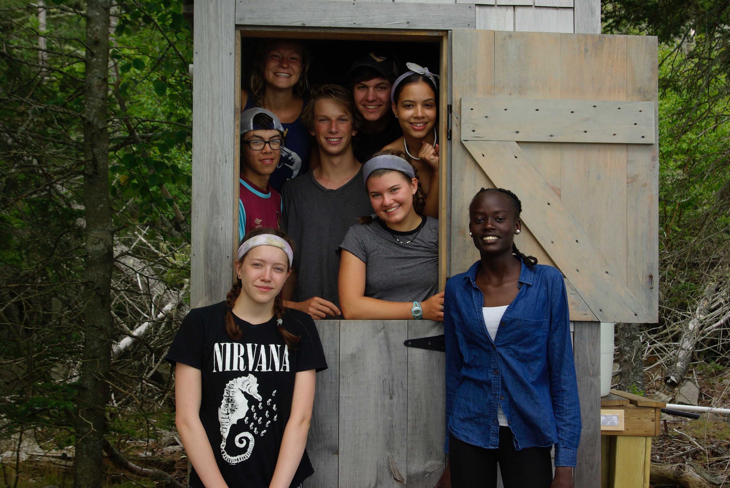 One of the rain barrel groups posing at their install locale