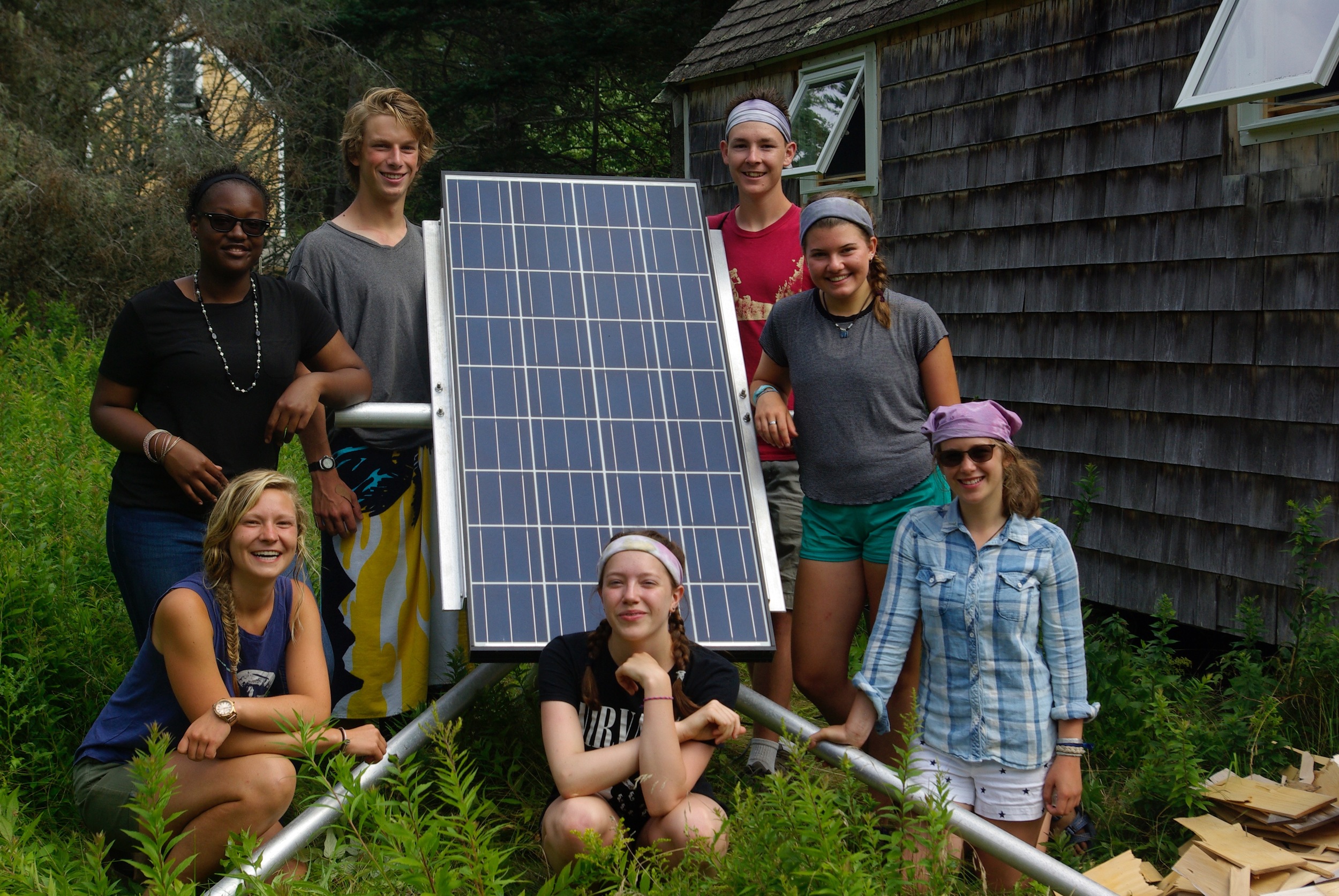  Part of our crew standing next to their photovoltaic install