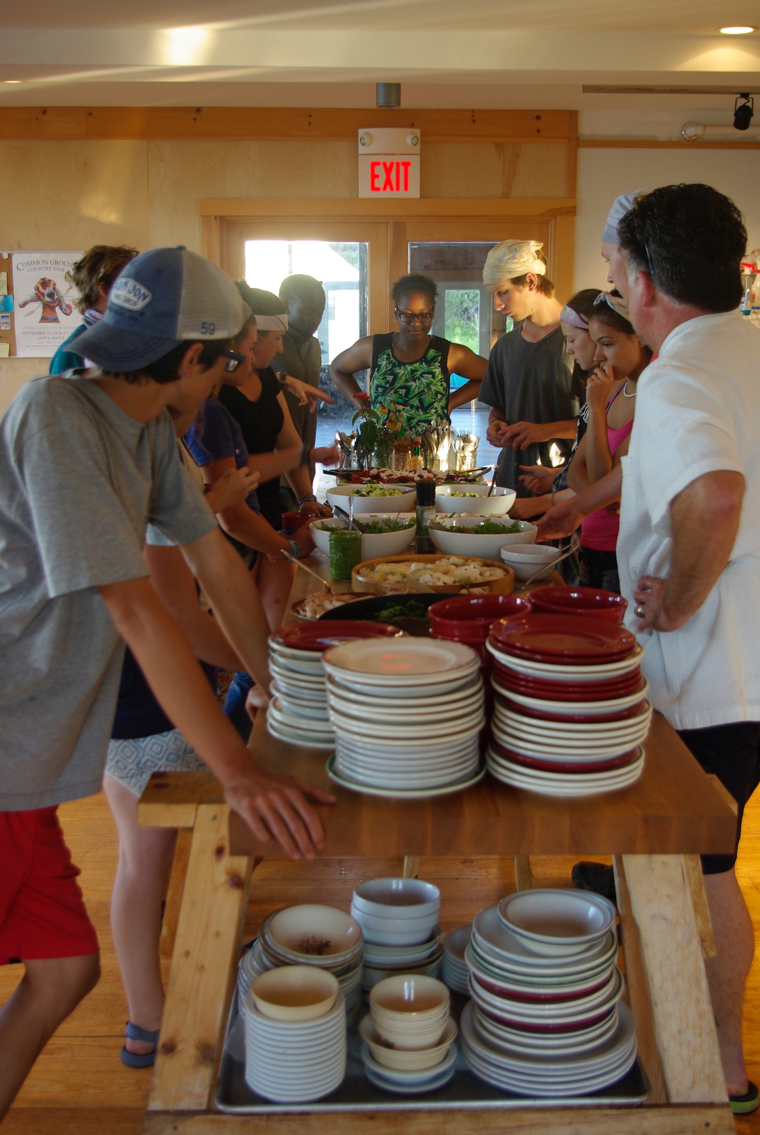 Adding final touches to the dishes cooked by the students Friday night