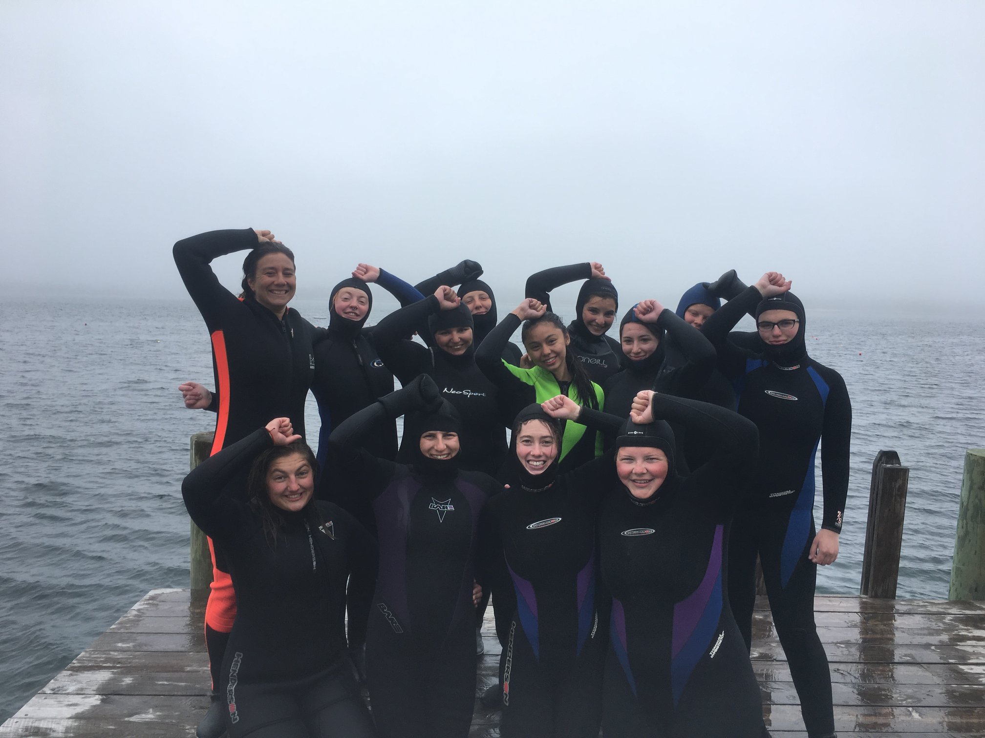 Women of the Sea, right after snorkeling, doing a diving sign, letting us know they are "O.K."'