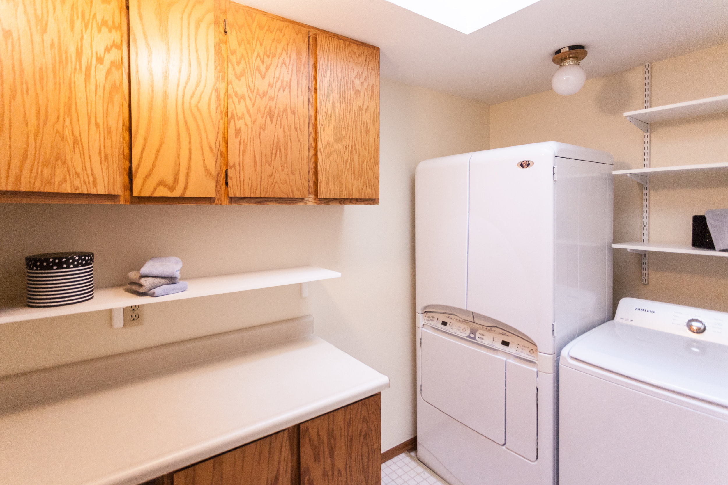  Dedicated laundry-room. Dryer with a stand-up dryer section is an extra bonus. Just outside the master-bedroom and the two additional bedrooms. No traipsing down to the basement for laundry. 3 bedrooms on the upper floor. 