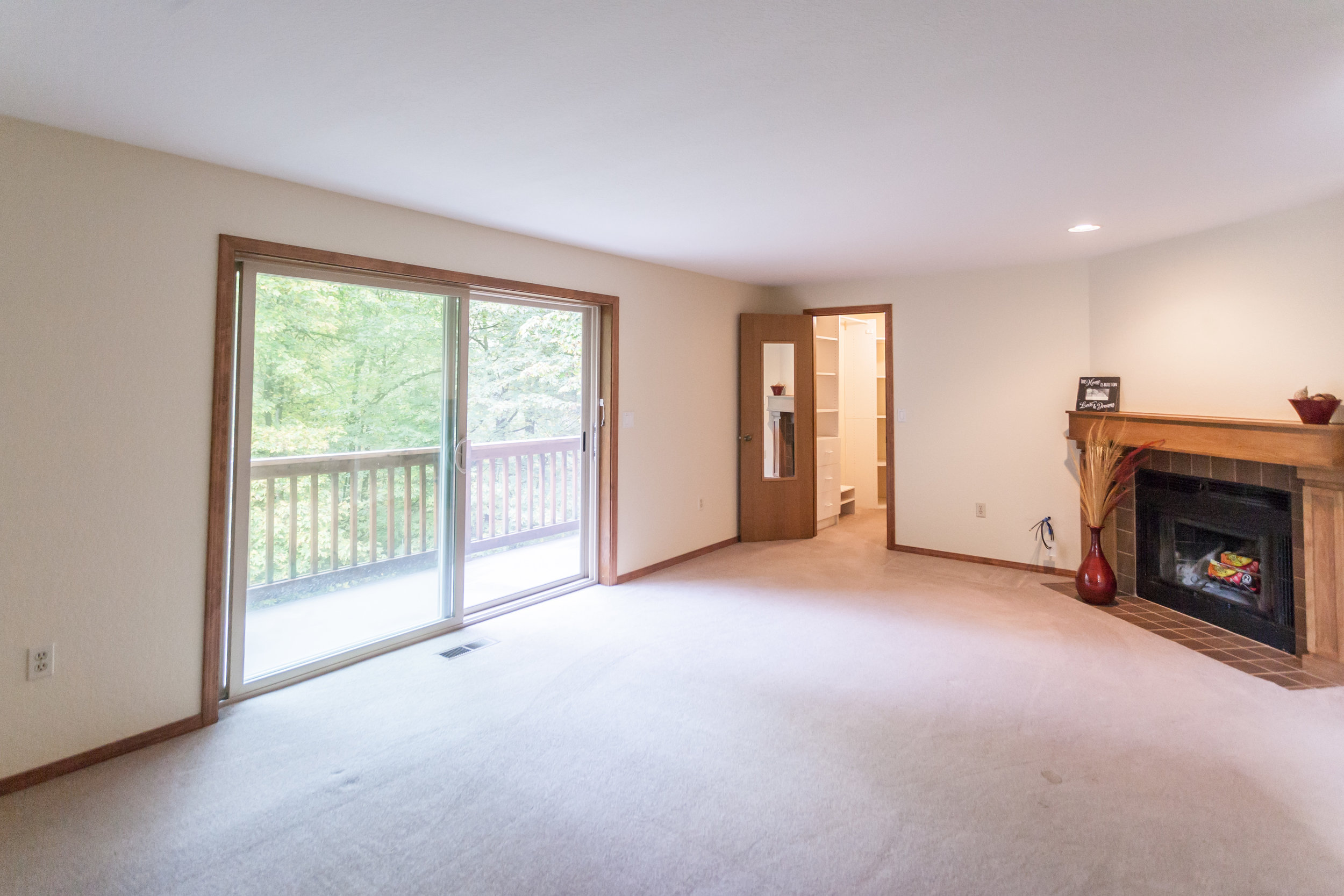  Master-bedroom with sitting balcony, fireplace, walk-in closet and room for much more. 