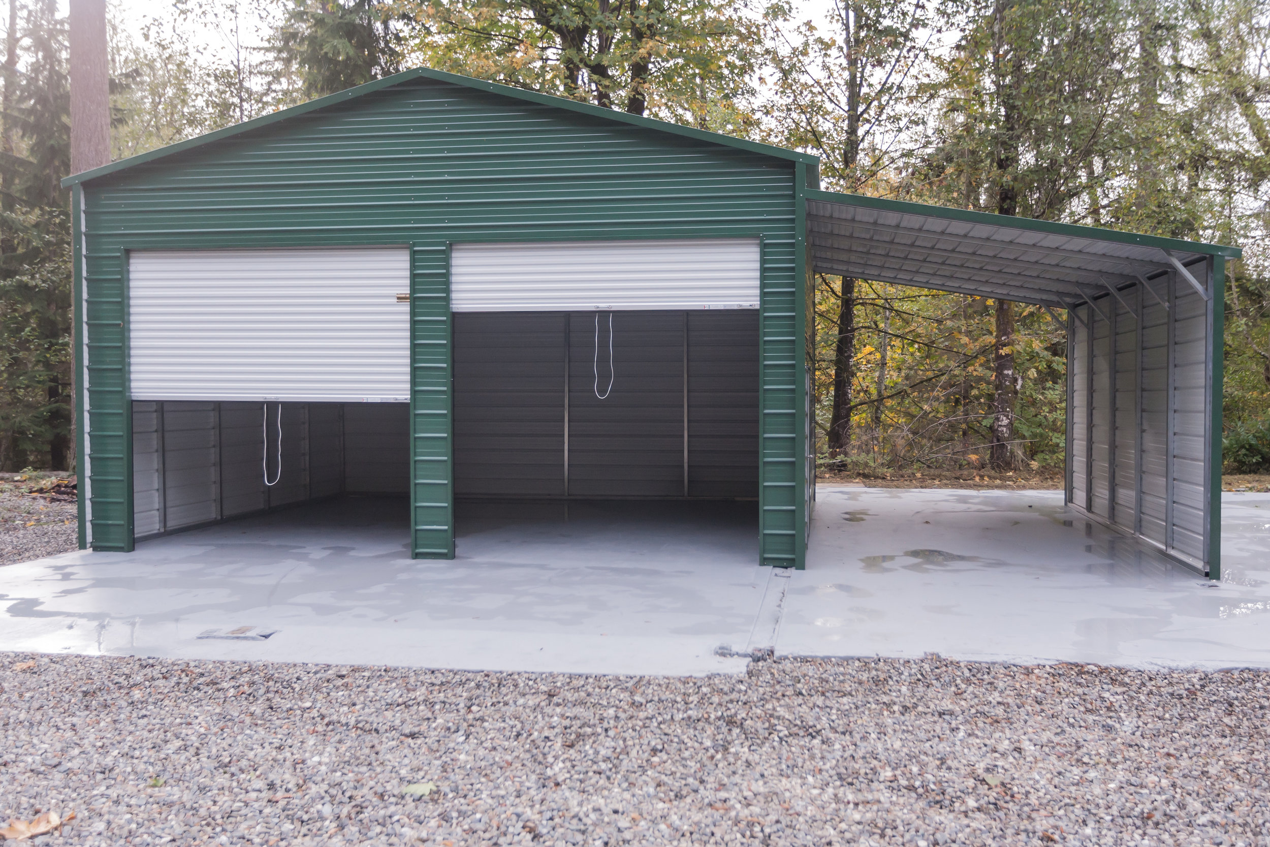  Newly built 2-car garage with overhang. RV parking. Shop? Electricity run to area and ready for your hook-ups. 
