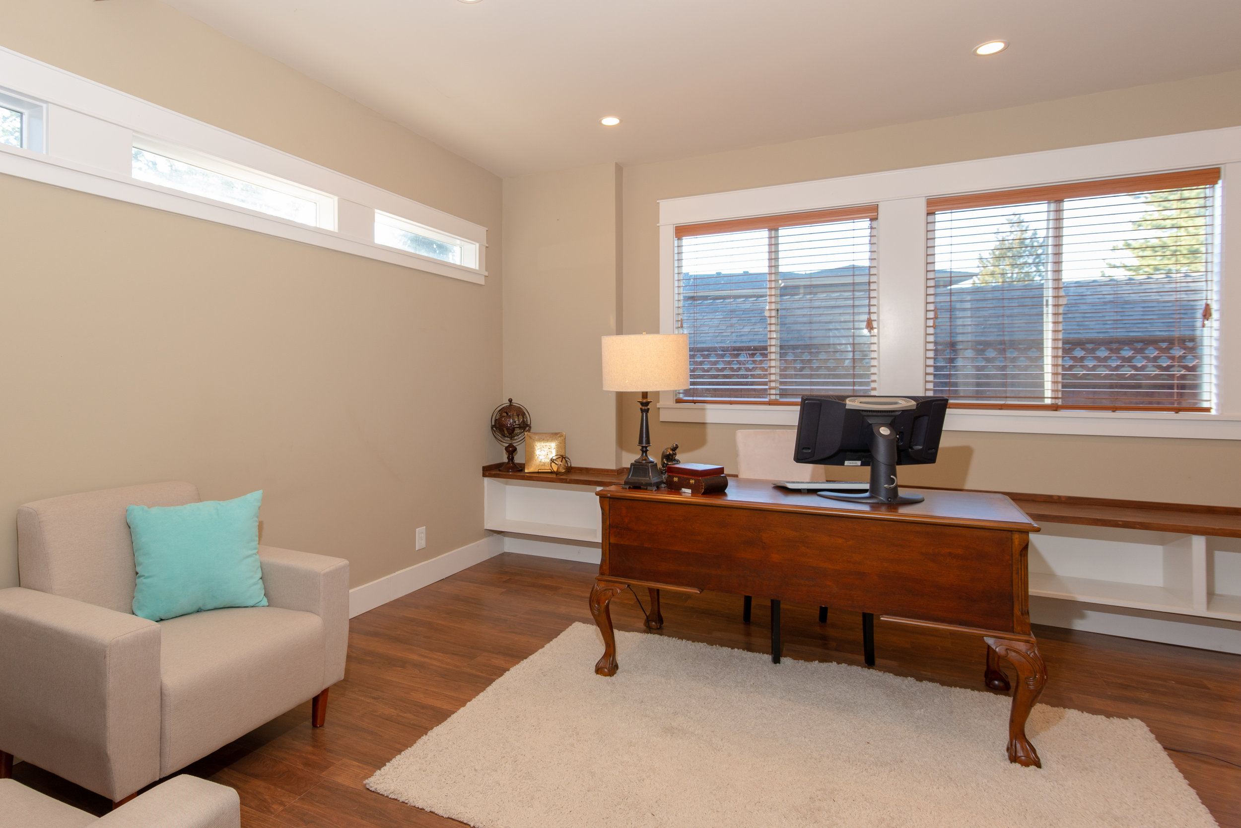  Third bedroom on the main floor offers many options. Private guest room, third bedroom, office or study. 
